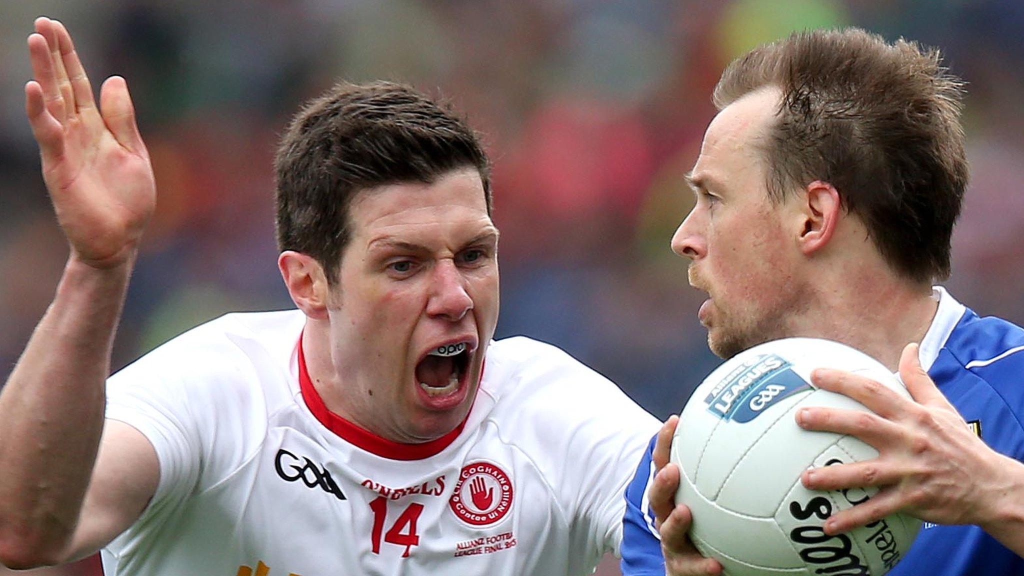 Tyrone's Sean Cavanagh challenges Cavan's Seanie Johnston at Croke Park