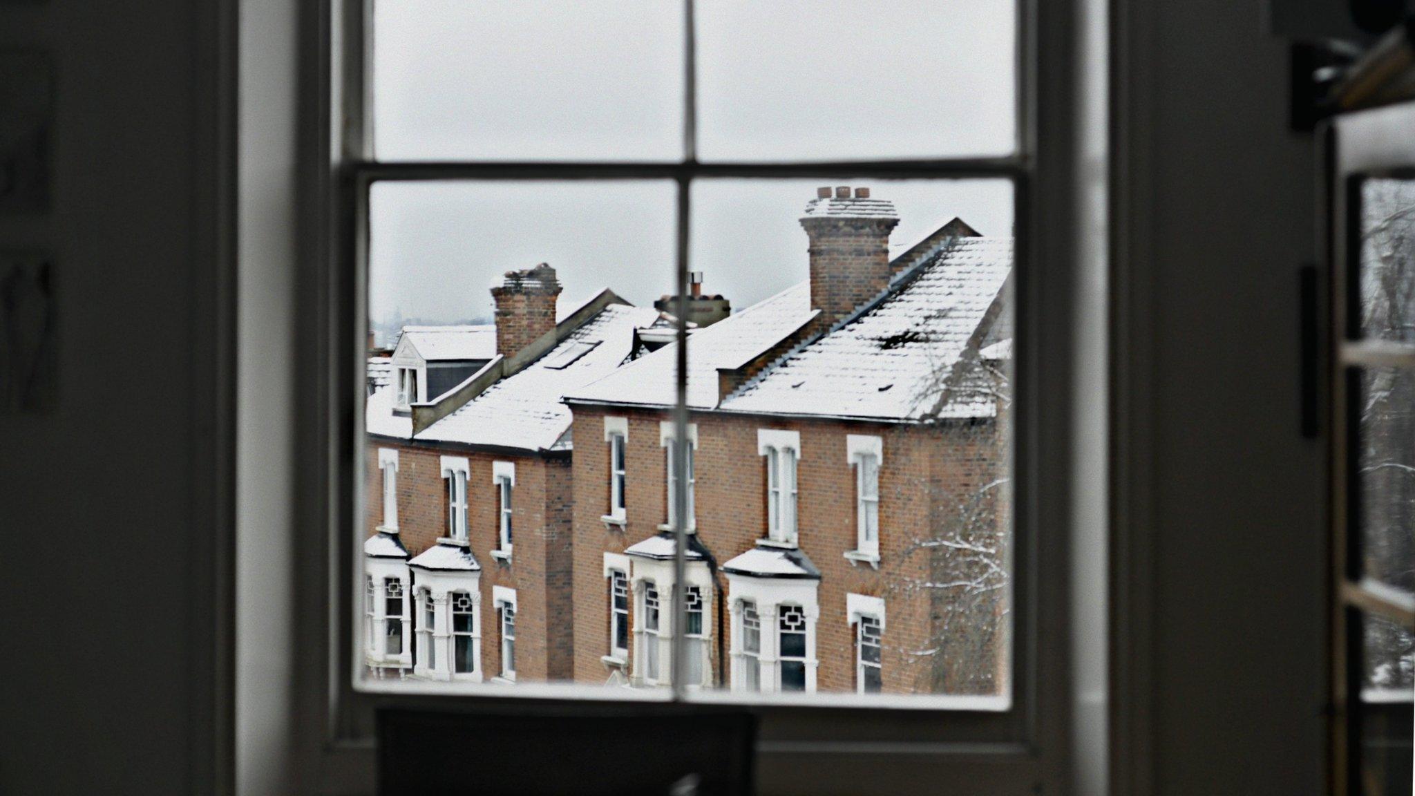 view of snow through window