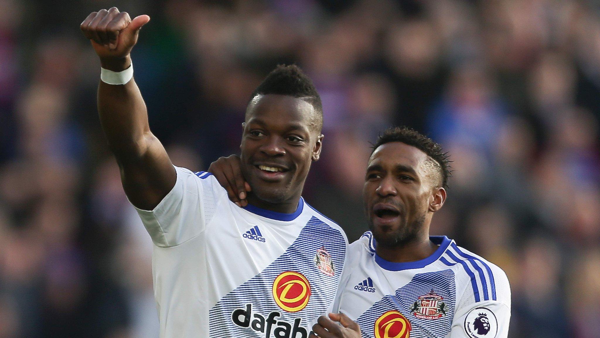 Kone and Defoe celebrate