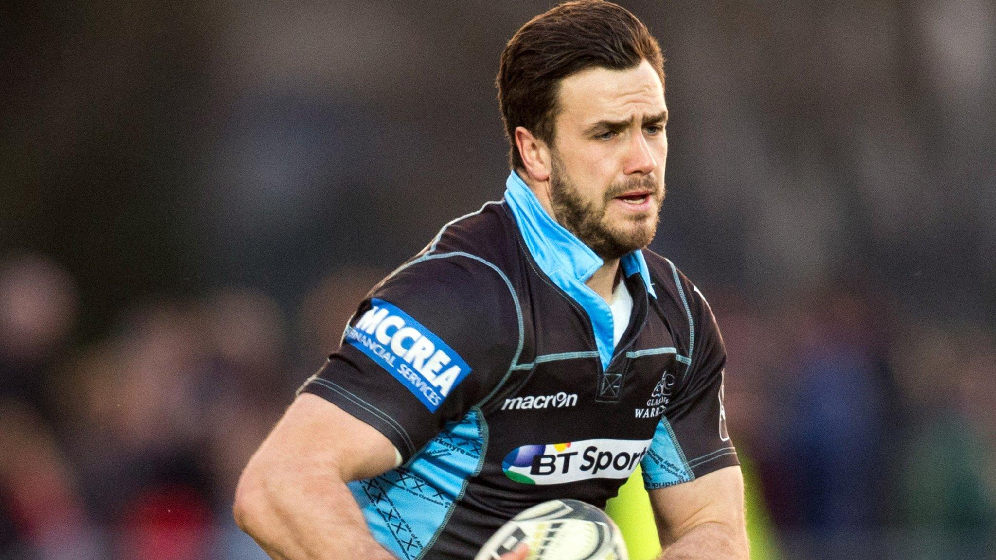 Alex Dunbar runs with the ball for Glasgow