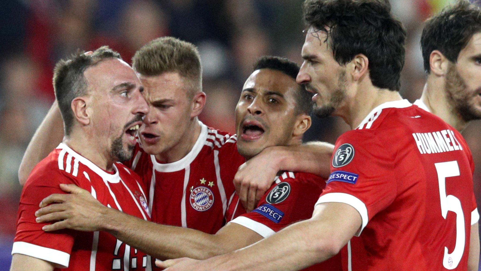 Bayern Munich players celebrate the equaliser in Seville