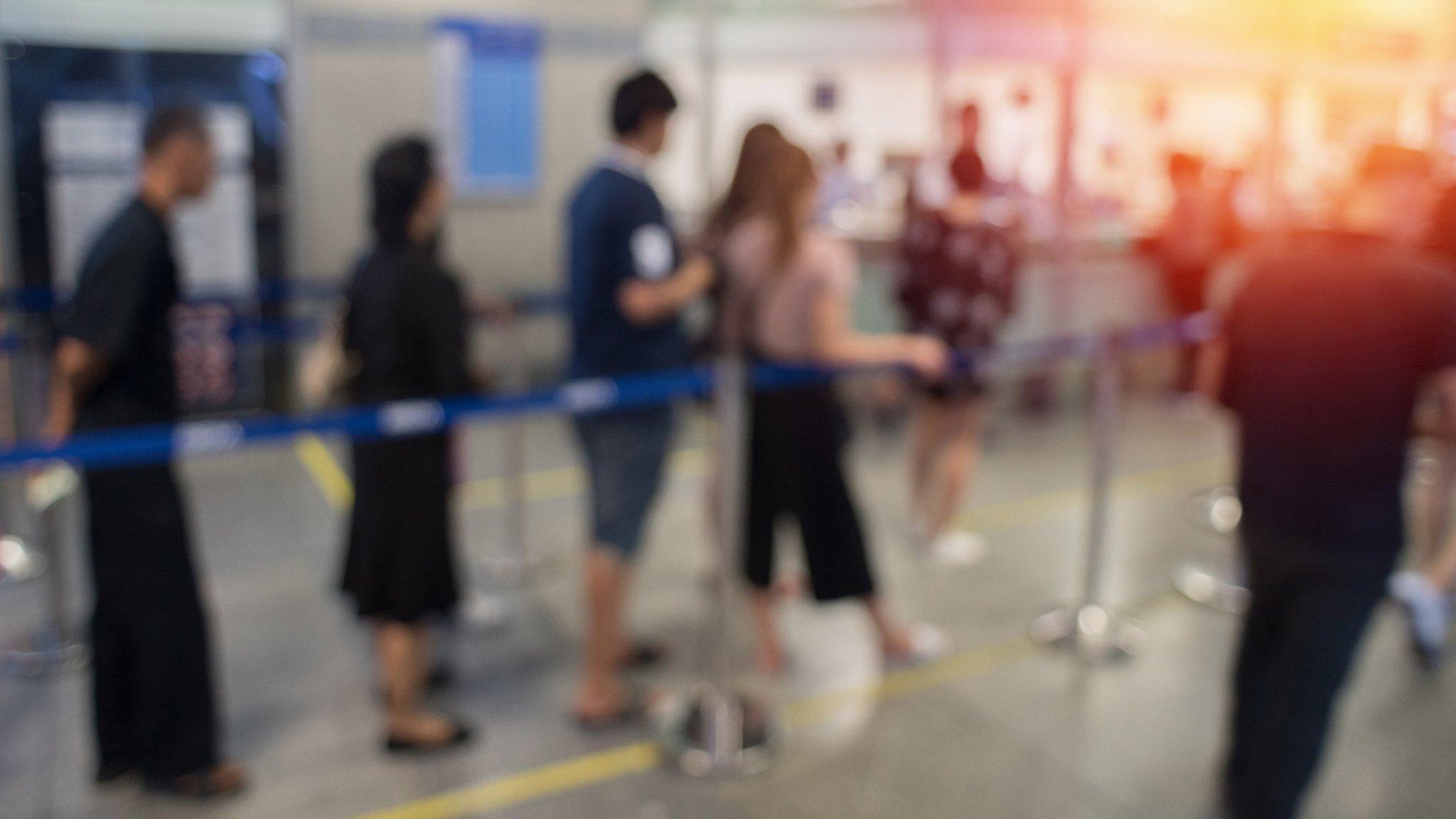 People queuing at passport control