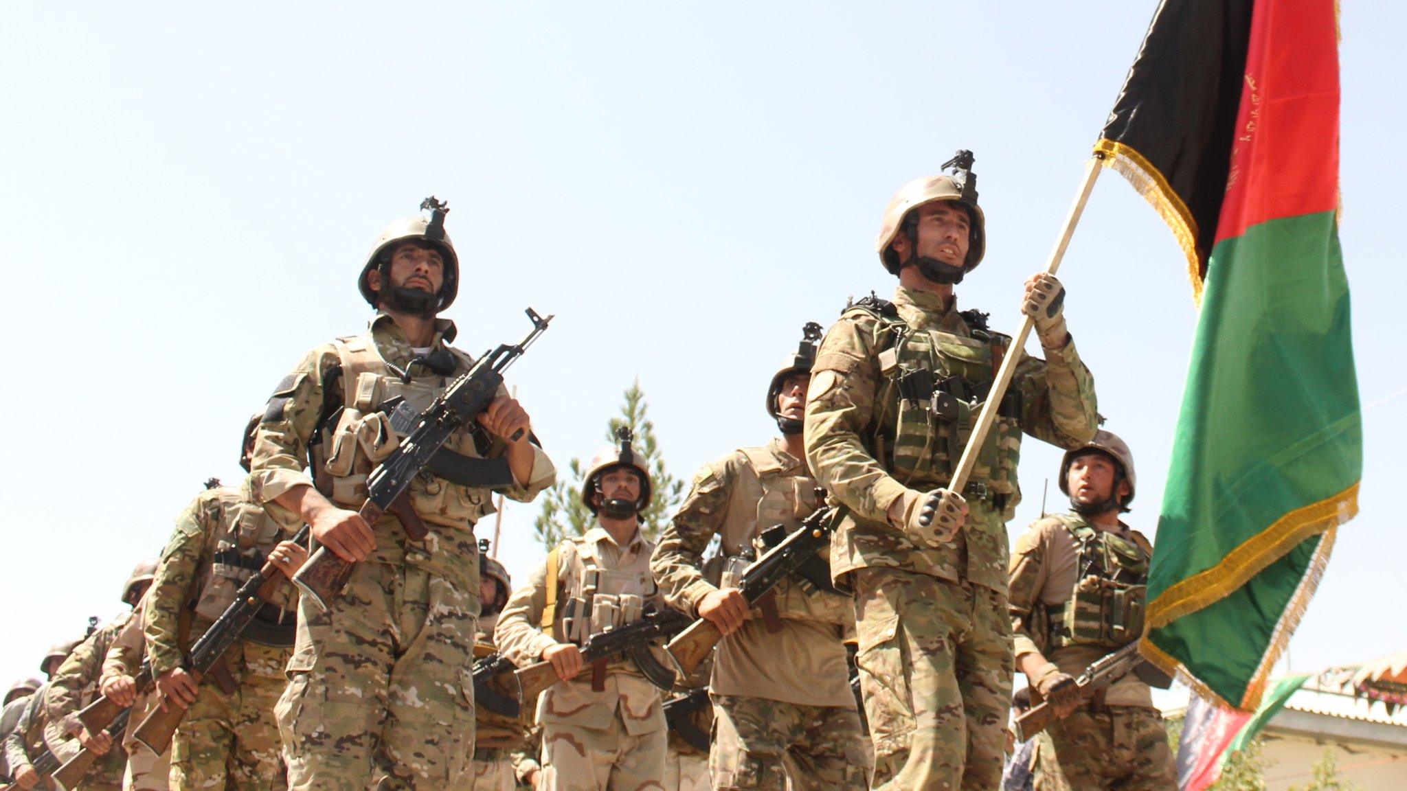 Afghan security forces pictured during a military march