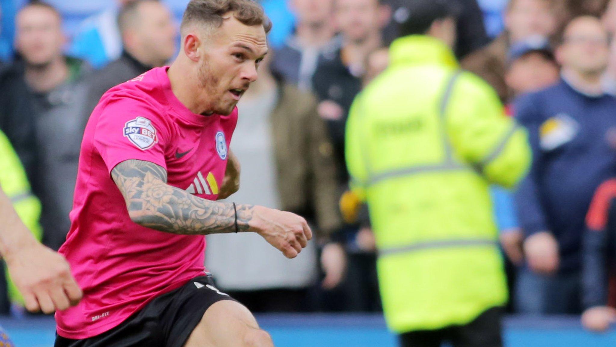 Jon Taylor of Peterborough United scores the winning goal