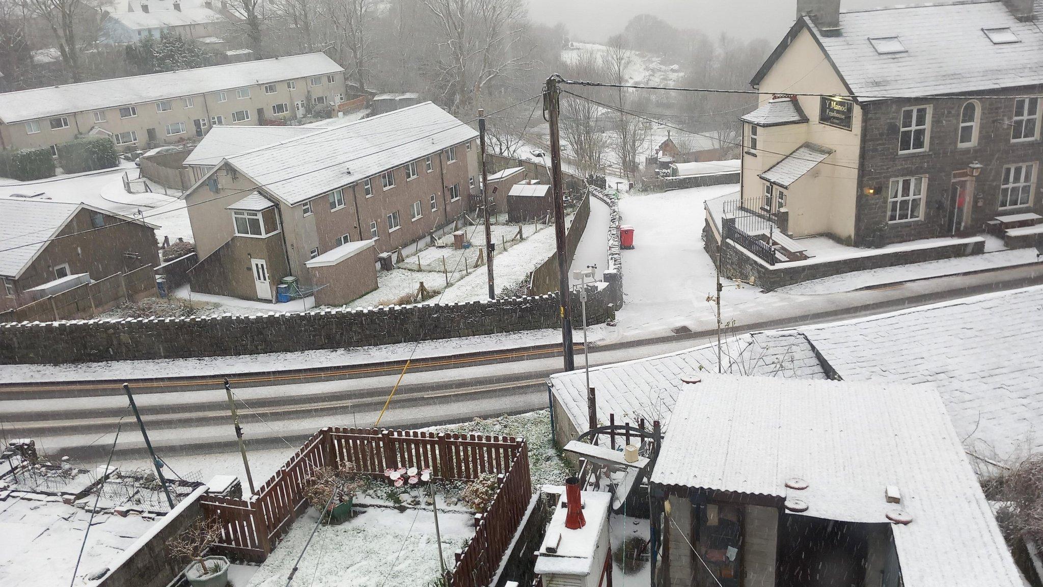 Snowy rooftops and road at Blaenau Ffestiniog