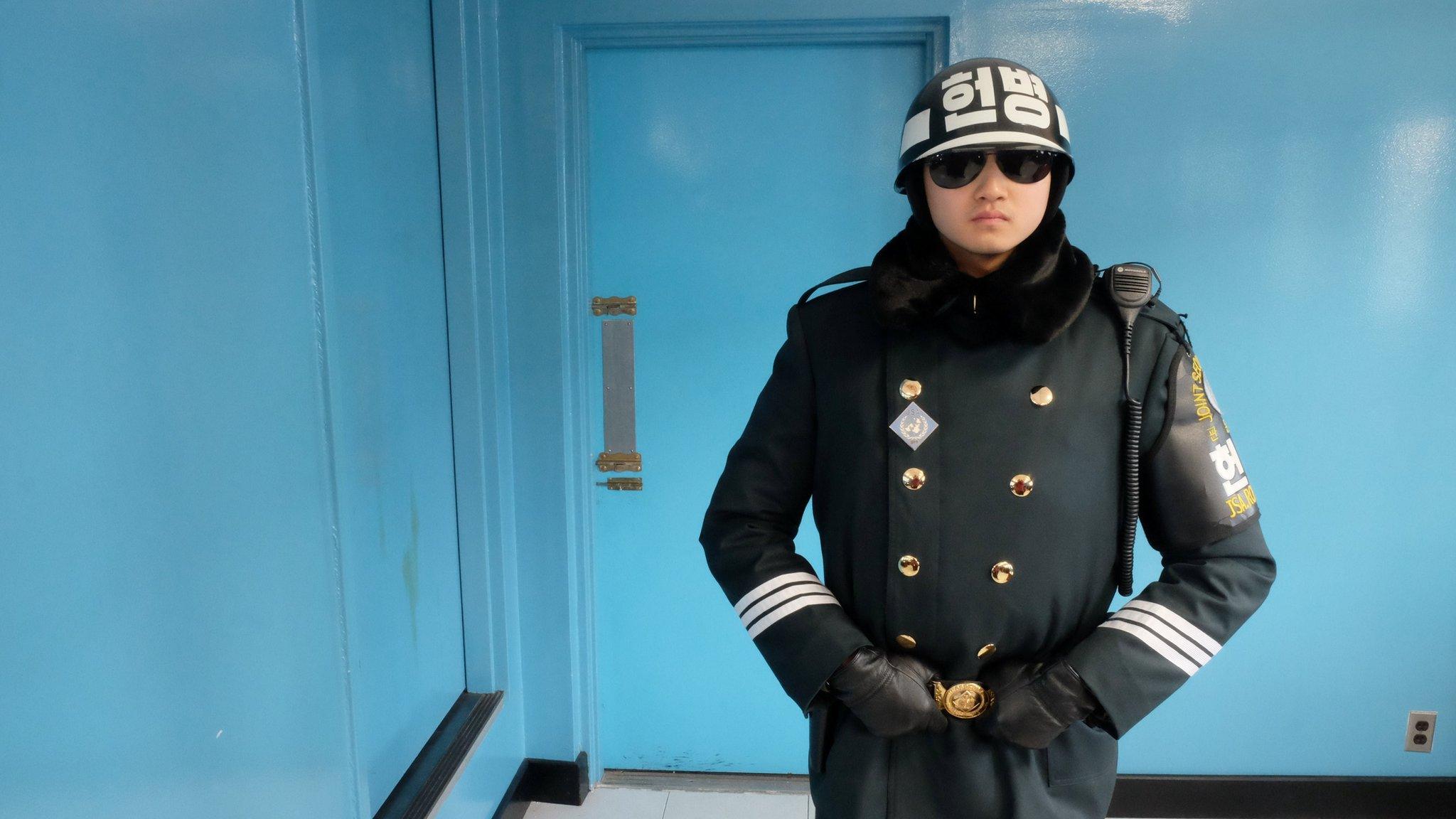 South Korean soldiers stand guard in the demilitarized zone separating the two Koreas, in the truce village of Panmunjom, South Korea February 7, 2018