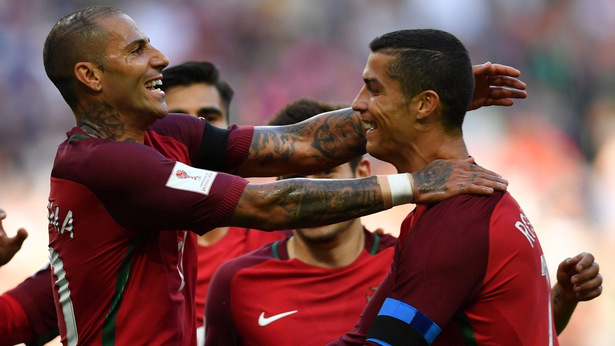 Portugal celebrate scoring against Mexico