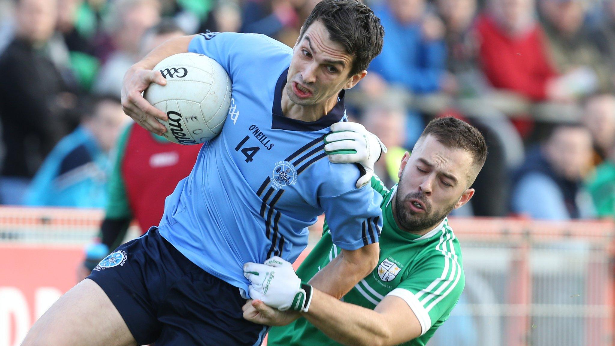 Killyclogher forward Tomas Flanagan is tackled by Cargin's Martin Kane