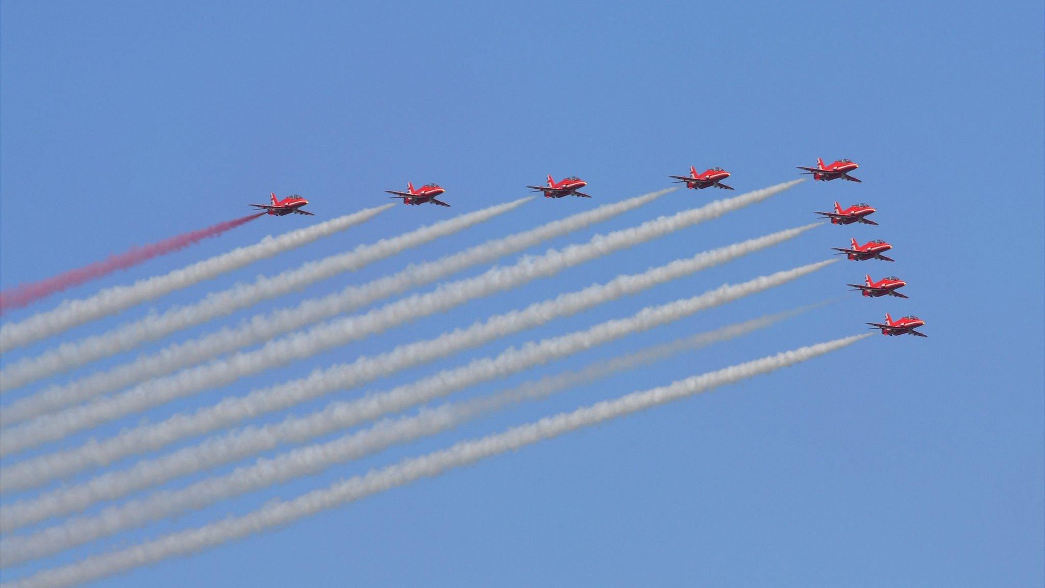 Red Arrows perform a flypast in the honour of Guernsey's lieutenant governor