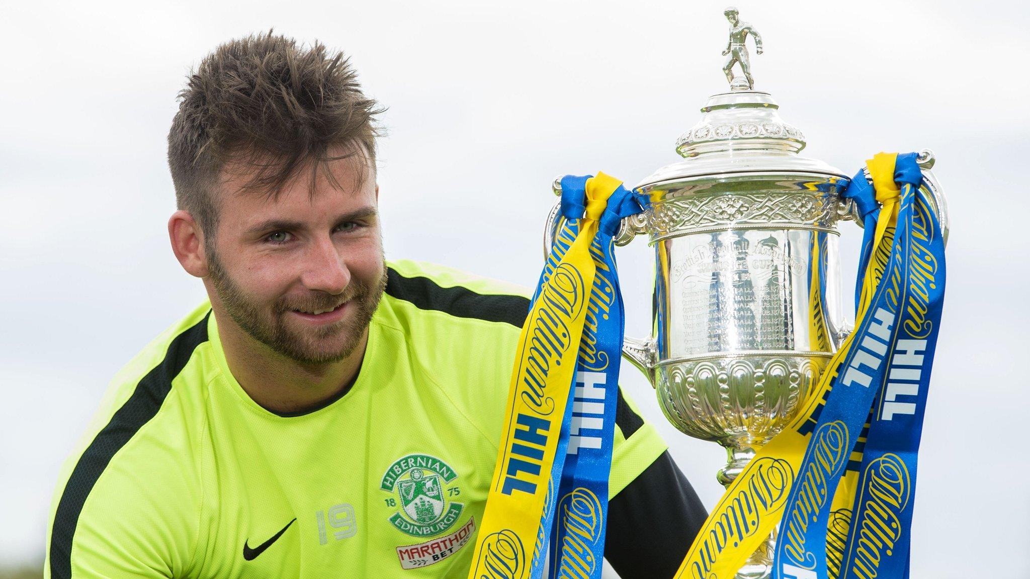 Hibs' James Keatings with the Scottish Cup