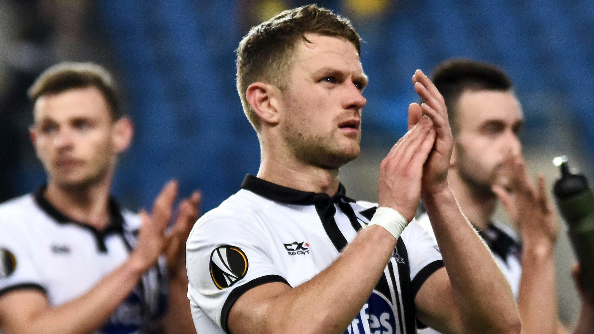 Dundalk players acknowledge their fans after the defeat by Maccabi Tel Aviv