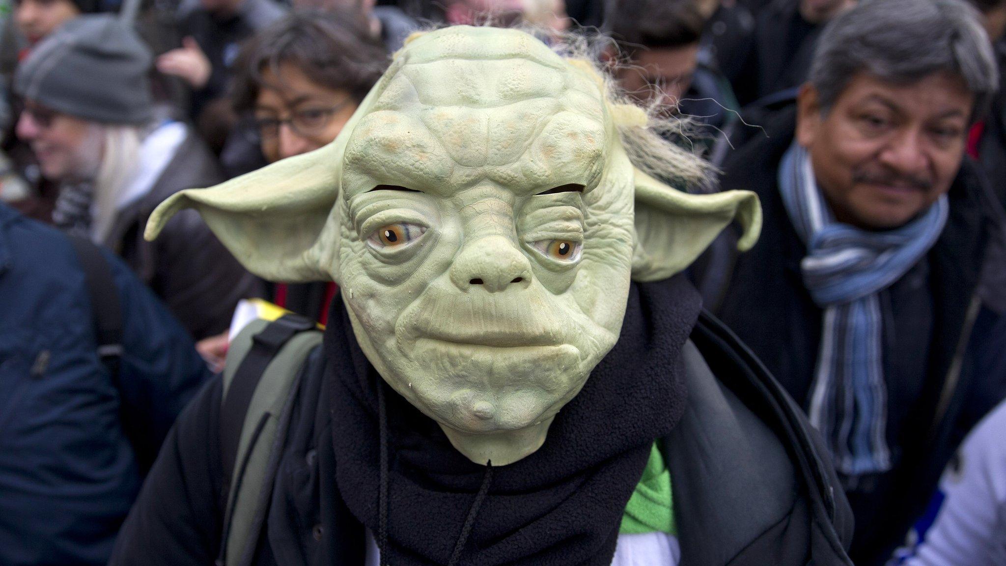 A fan dressed as Yoda at the London premiere of The Force Awakens