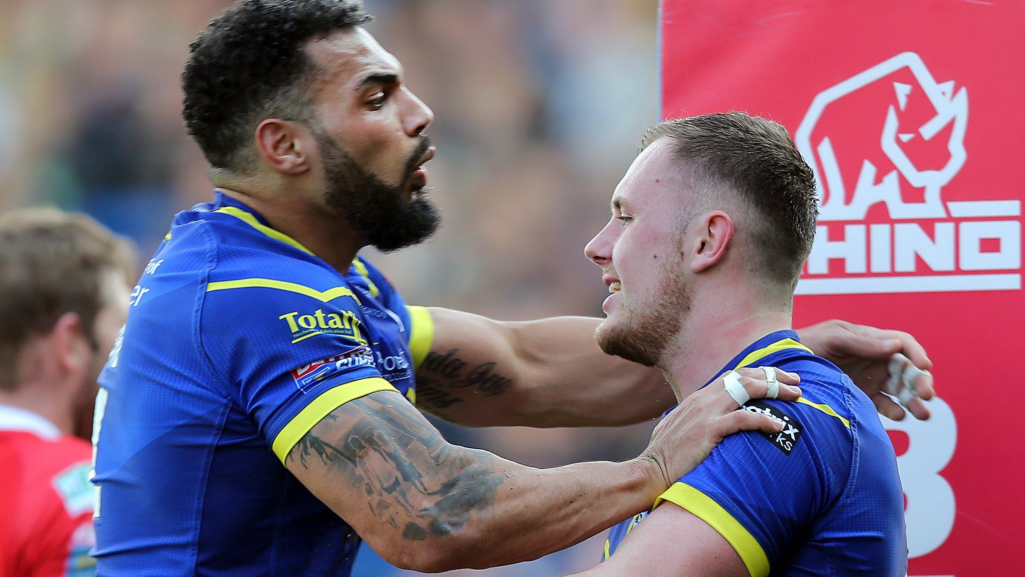 Ben Currie celebrates scoring Warrington's third try against Hull KR