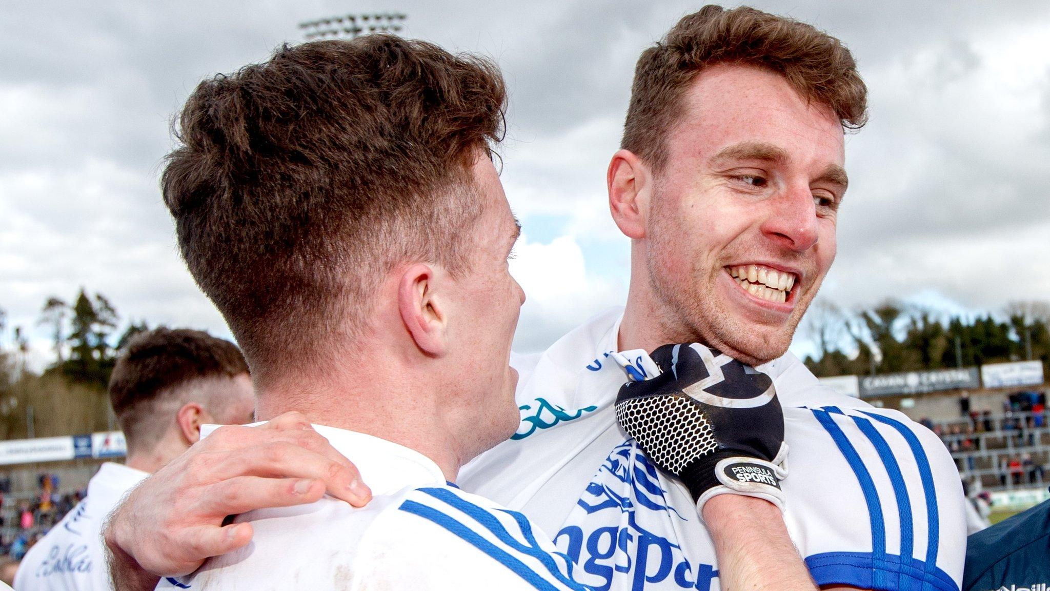 Dara McVeety and Conor Madden celebrate after Cavan clinch a dramatic promotion back to Division One