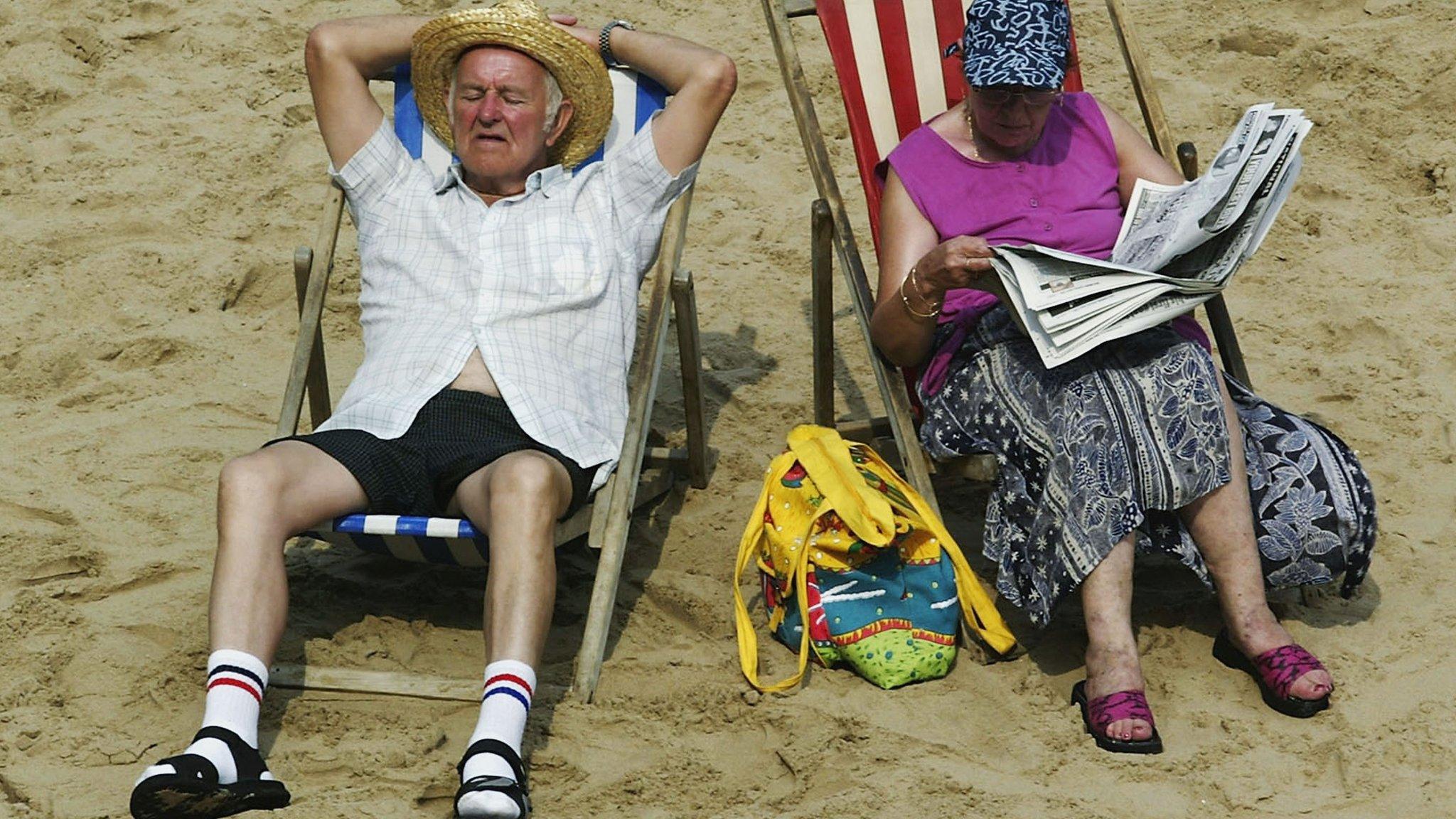 older couple on beach