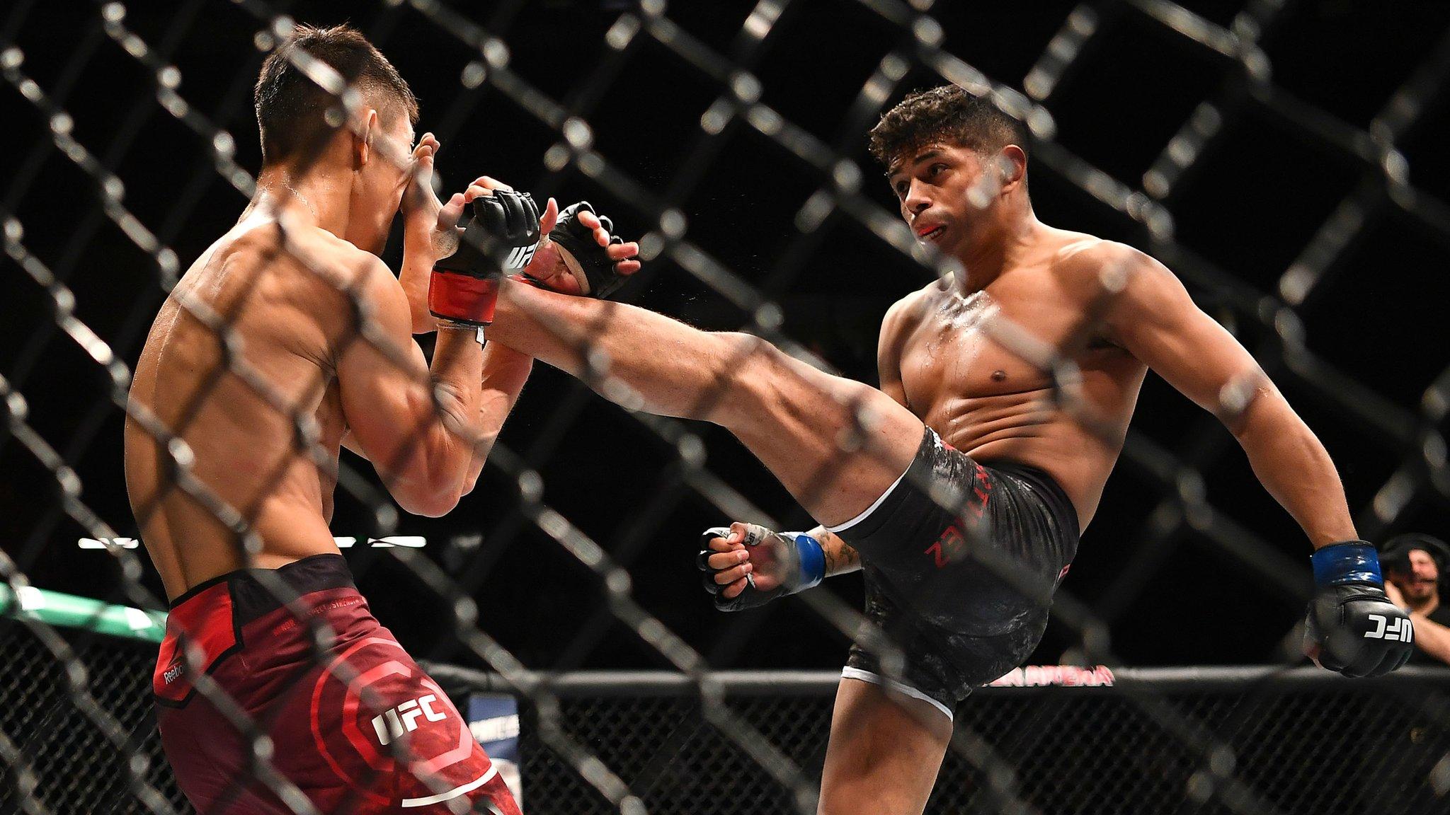 America's Jonathan Martinez, right, and Wuliji Buren, of China