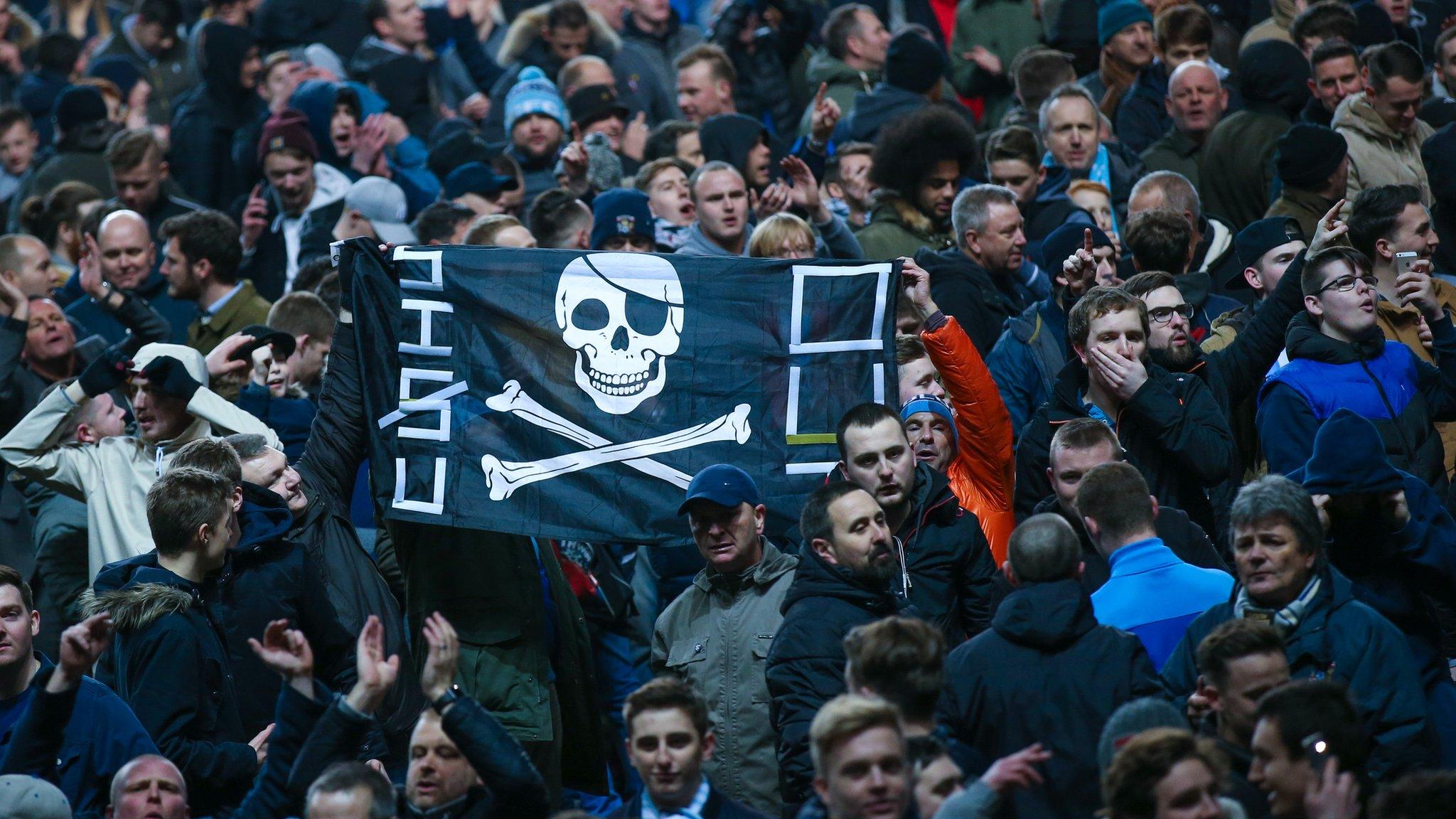 Sisu demonstration flag as Coventry City fans celebrate the Sky Blues' EFL Trophy semi-final victory over Wycombe Wanderers at the Ricoh Arena