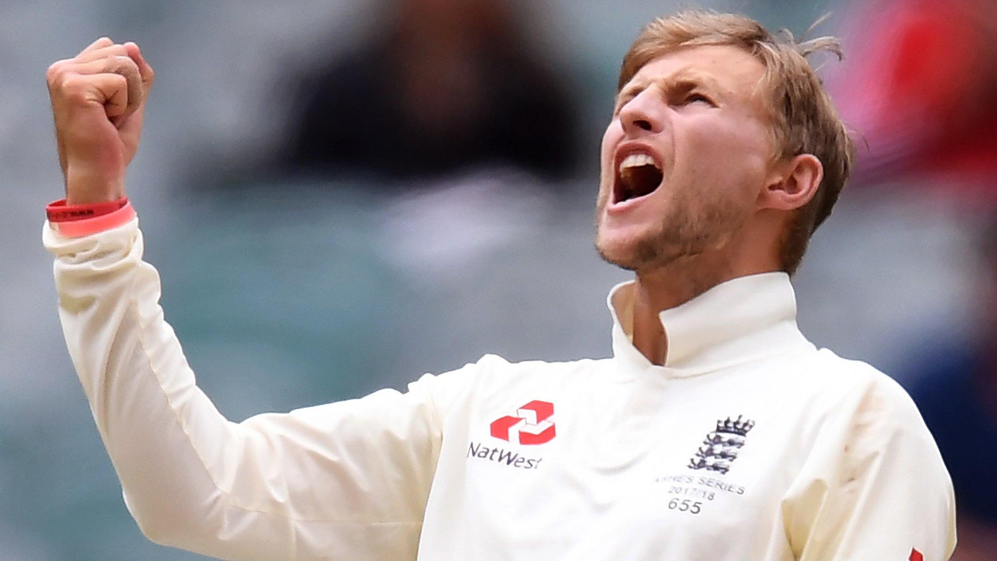 Joe Root celebrates taking the wicket of David Warner on day five at the MCG