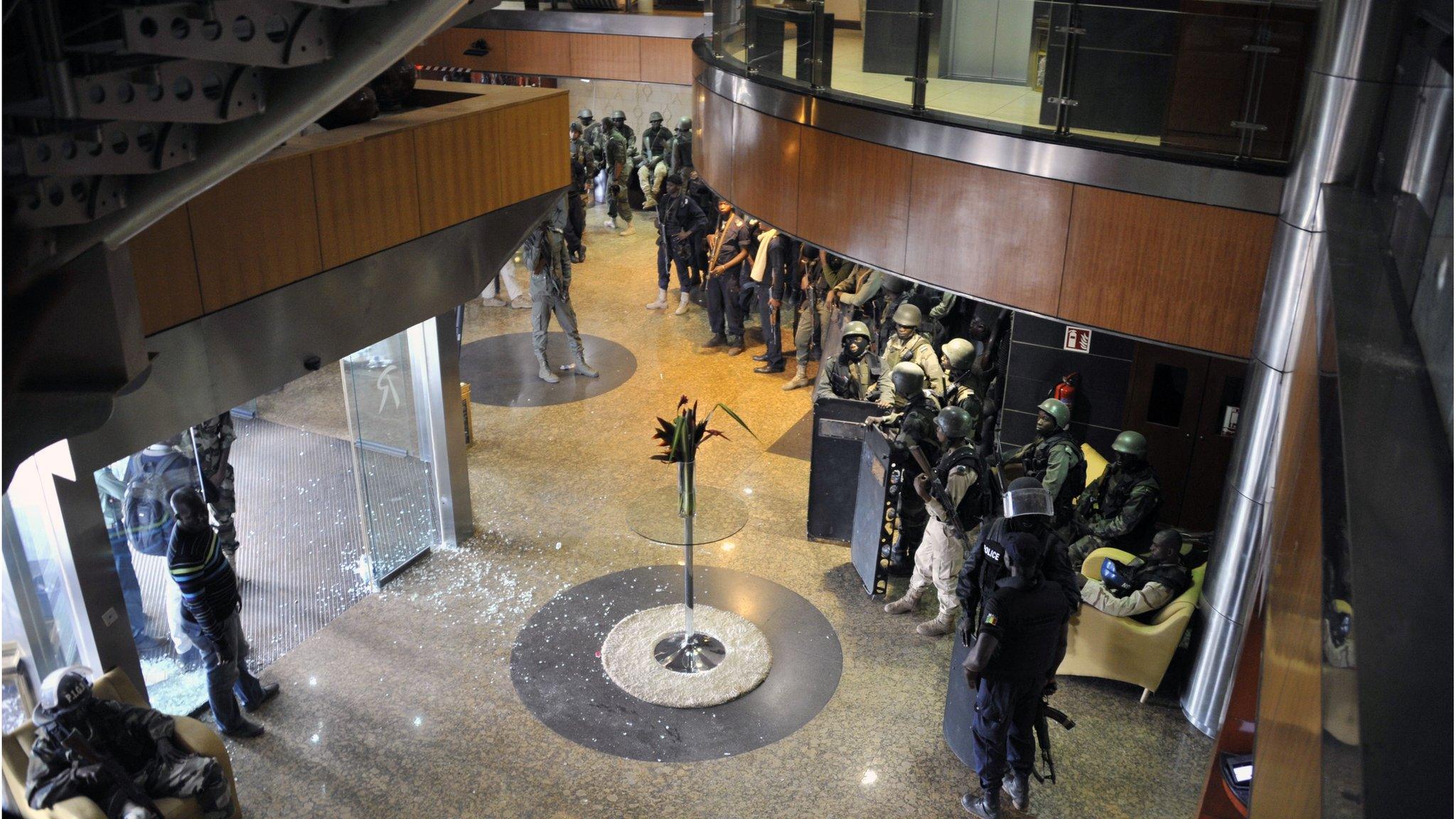 Members of special forces are seen inside the Radisson Blue Hotel in Bamako.