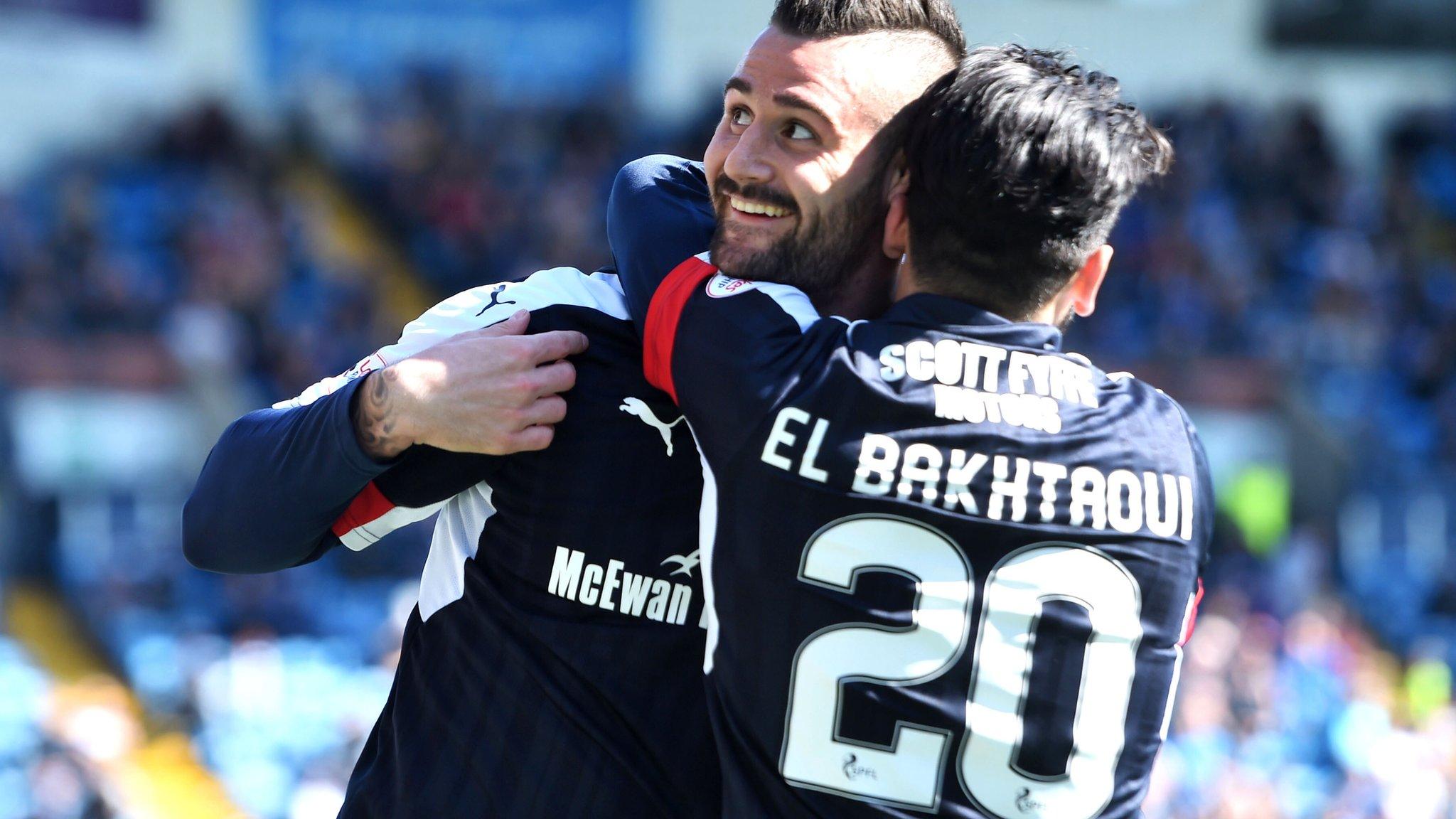 Dundee's Faissal El Bakhtaoui celebrates with goal hero Marcus Haber