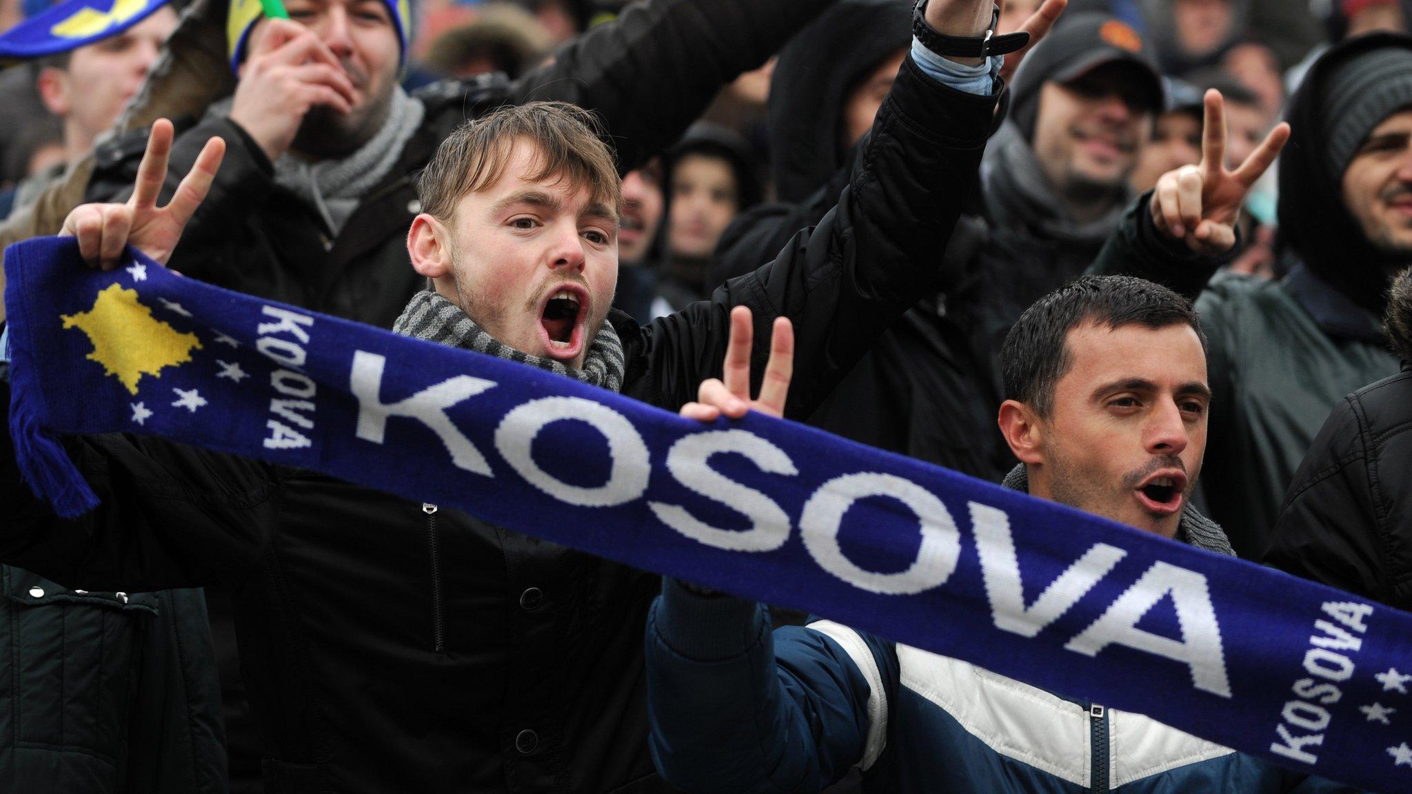 Kosovo fans watch their team against Haiti