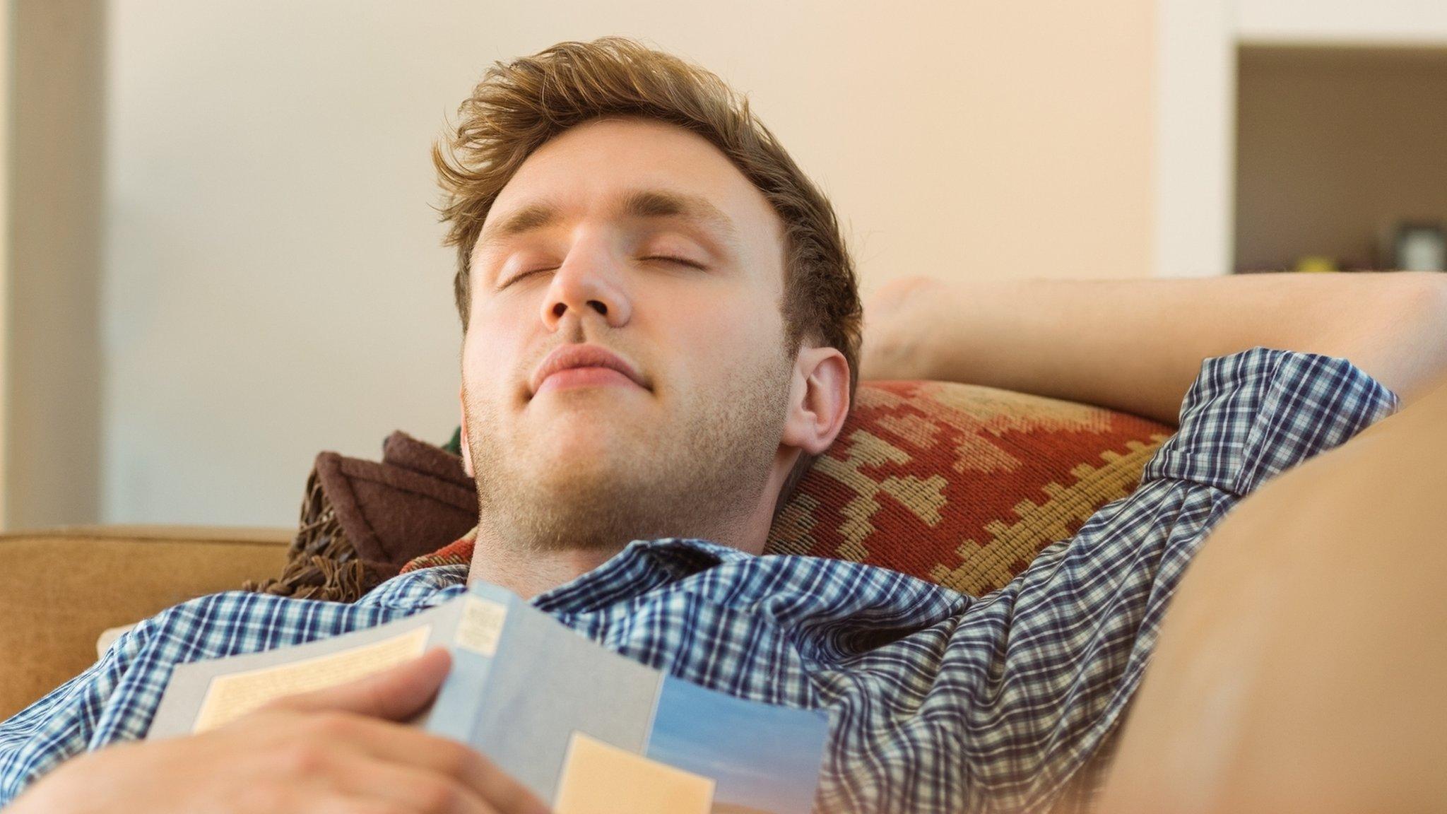 Napping man on the sofa