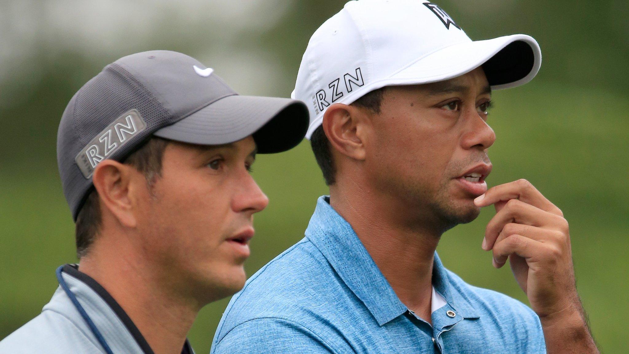 Chris Como and Tiger Woods