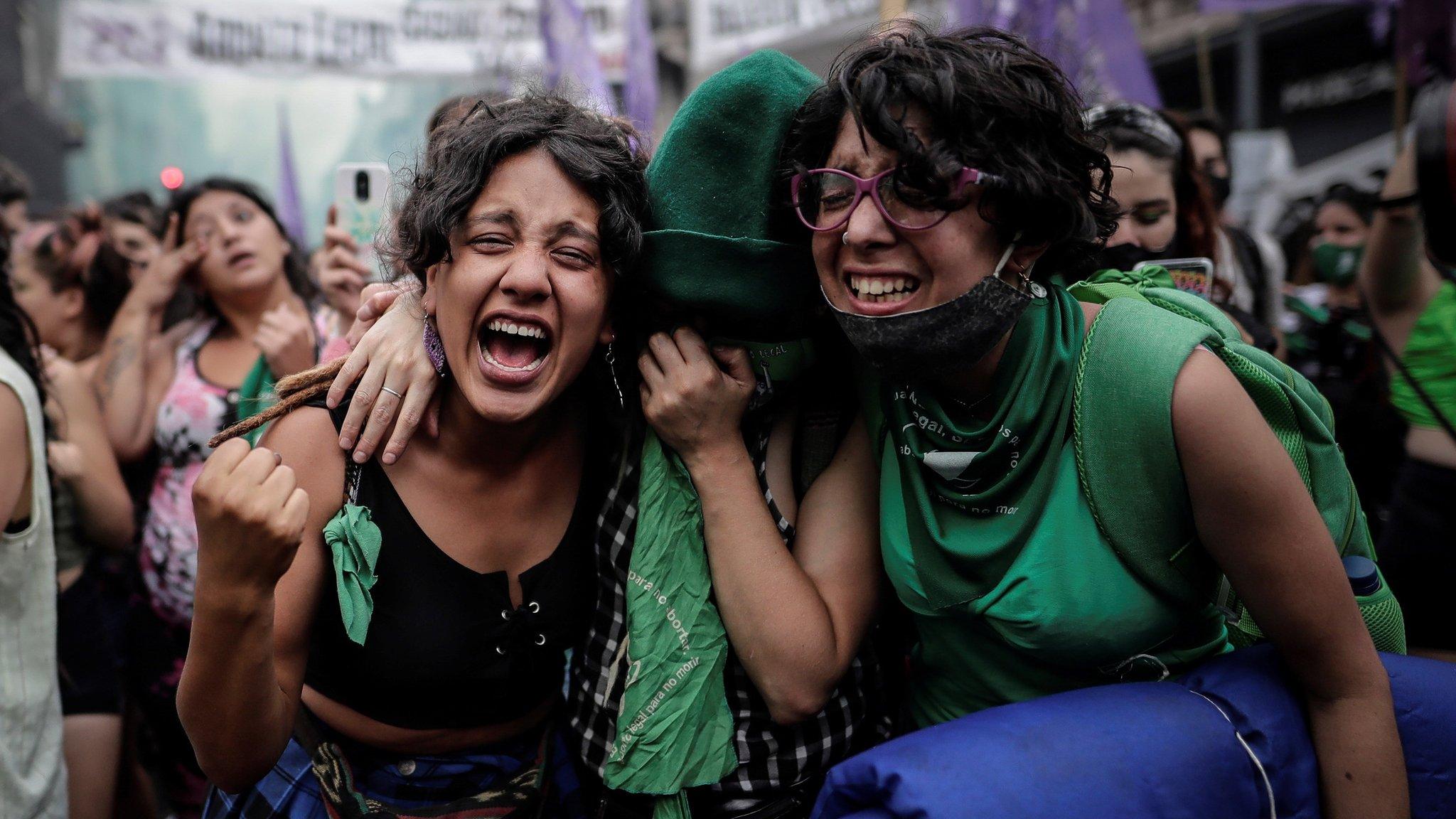 Women supporting the legalisation bill celebrate the vote