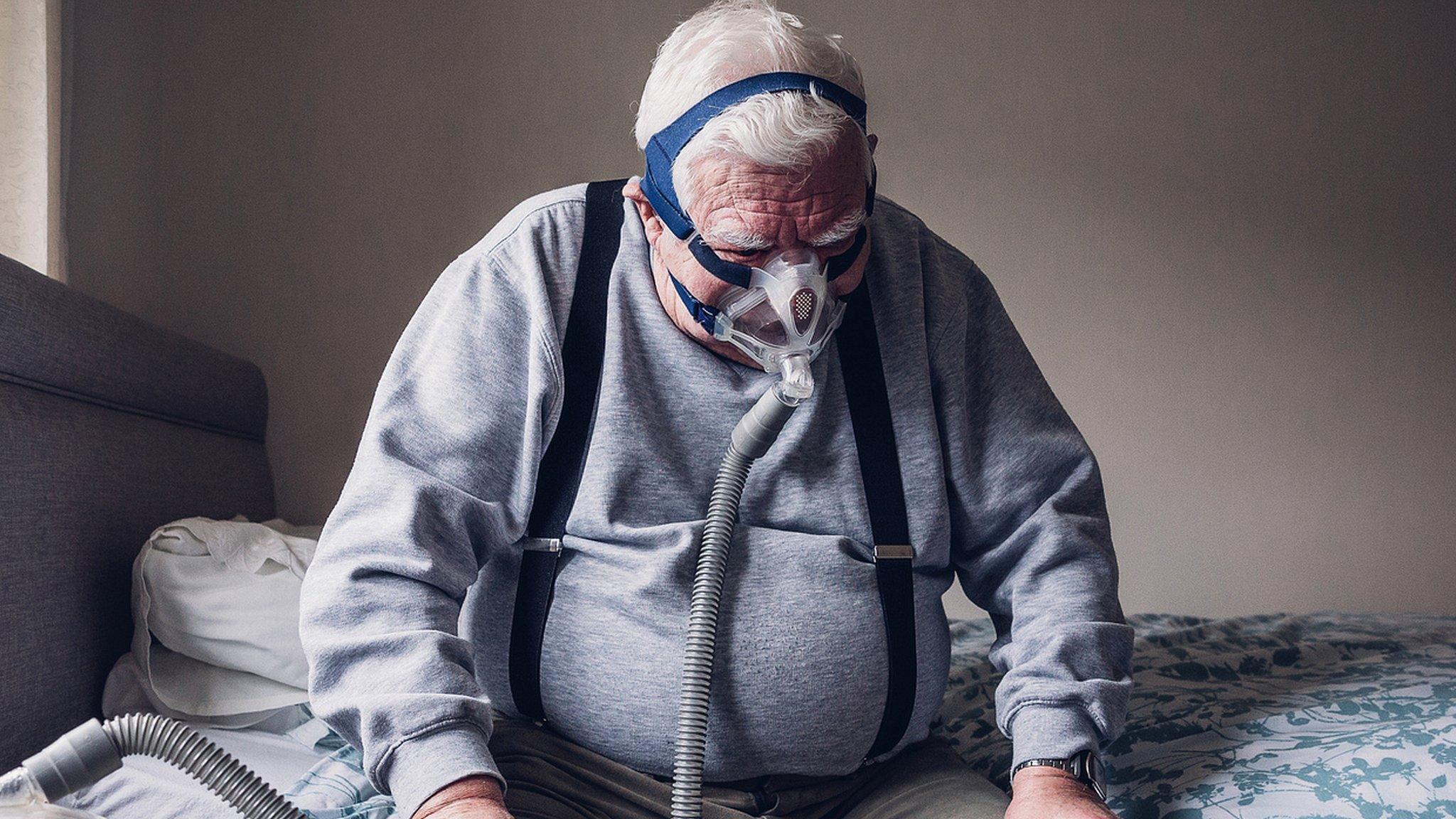 A man wearing a nasal sleep mask