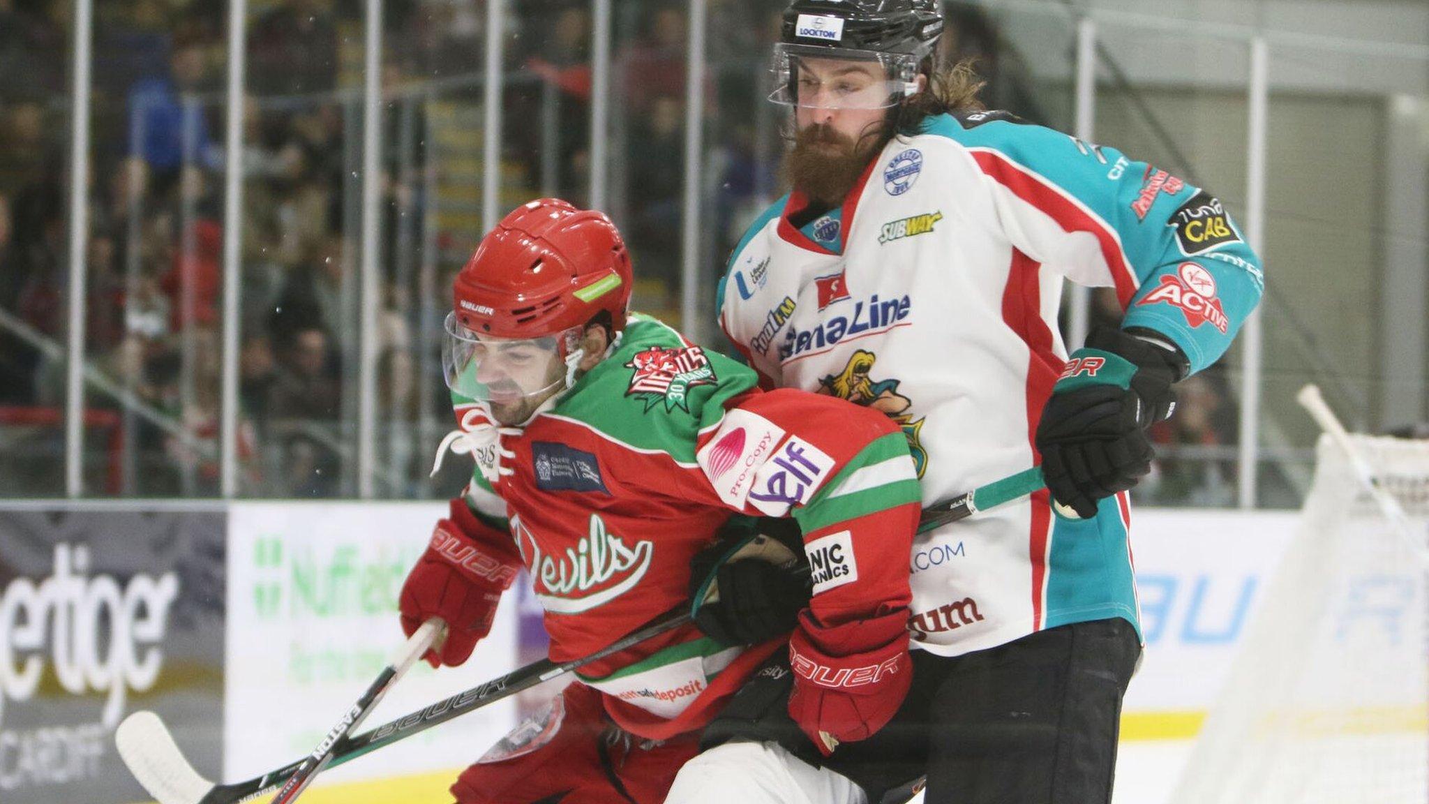 A Cardiff player is challenged in Sunday's game against the Giants