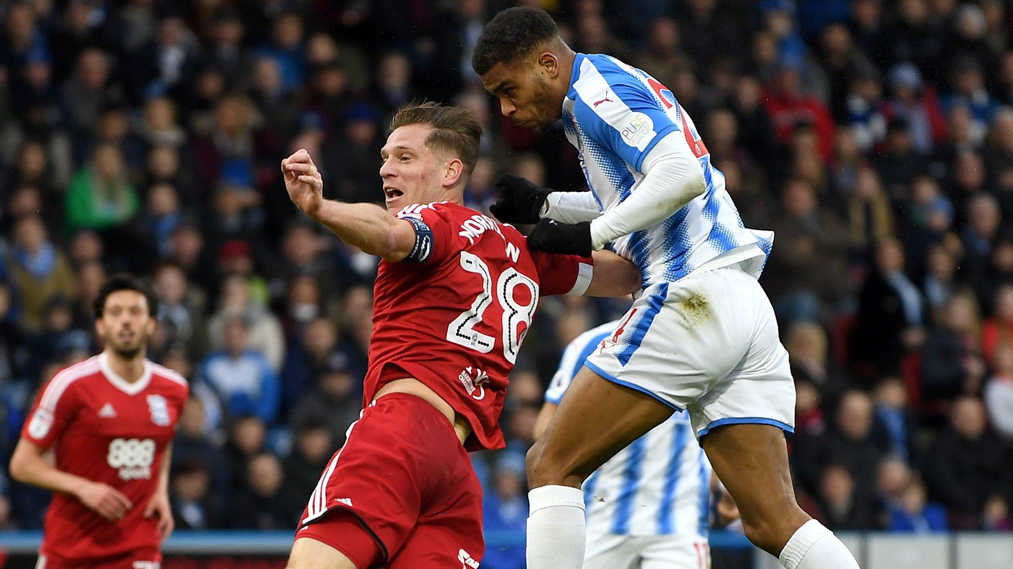 Steve Mounie scores Huddersfield's goal in the first half