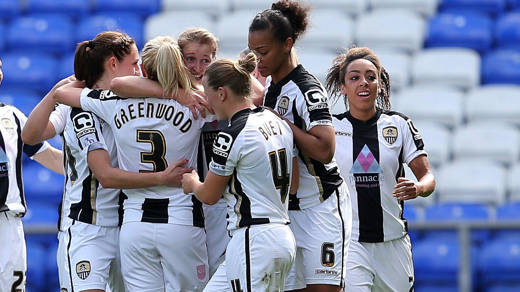 Notts County celebrate a semi-final goal against Everton at Goodison Park