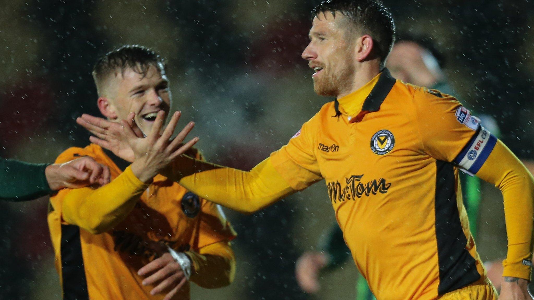 Scot Bennett celebrates after scoring for Newport County