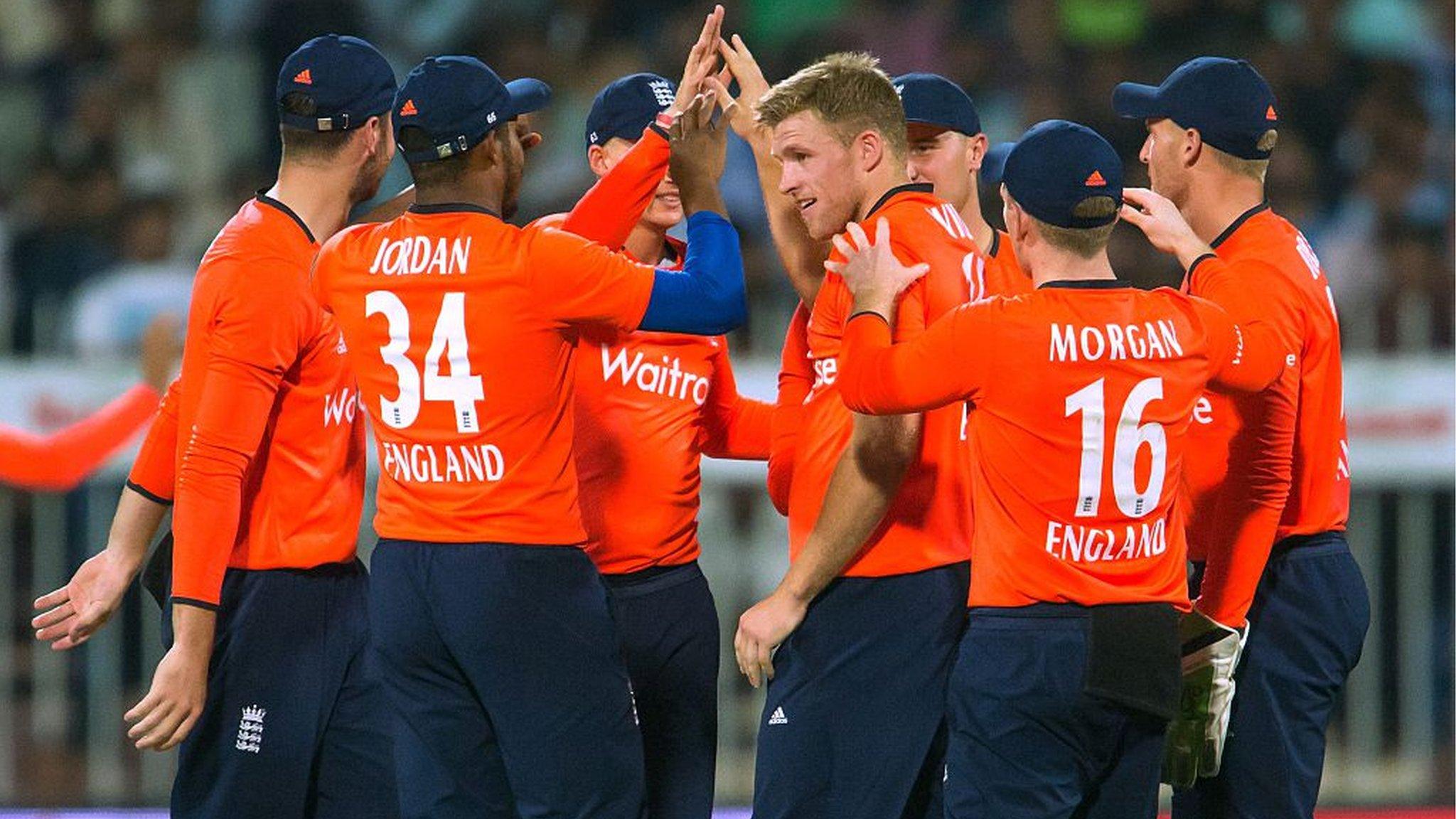 England celebrate a wicket for David Willey