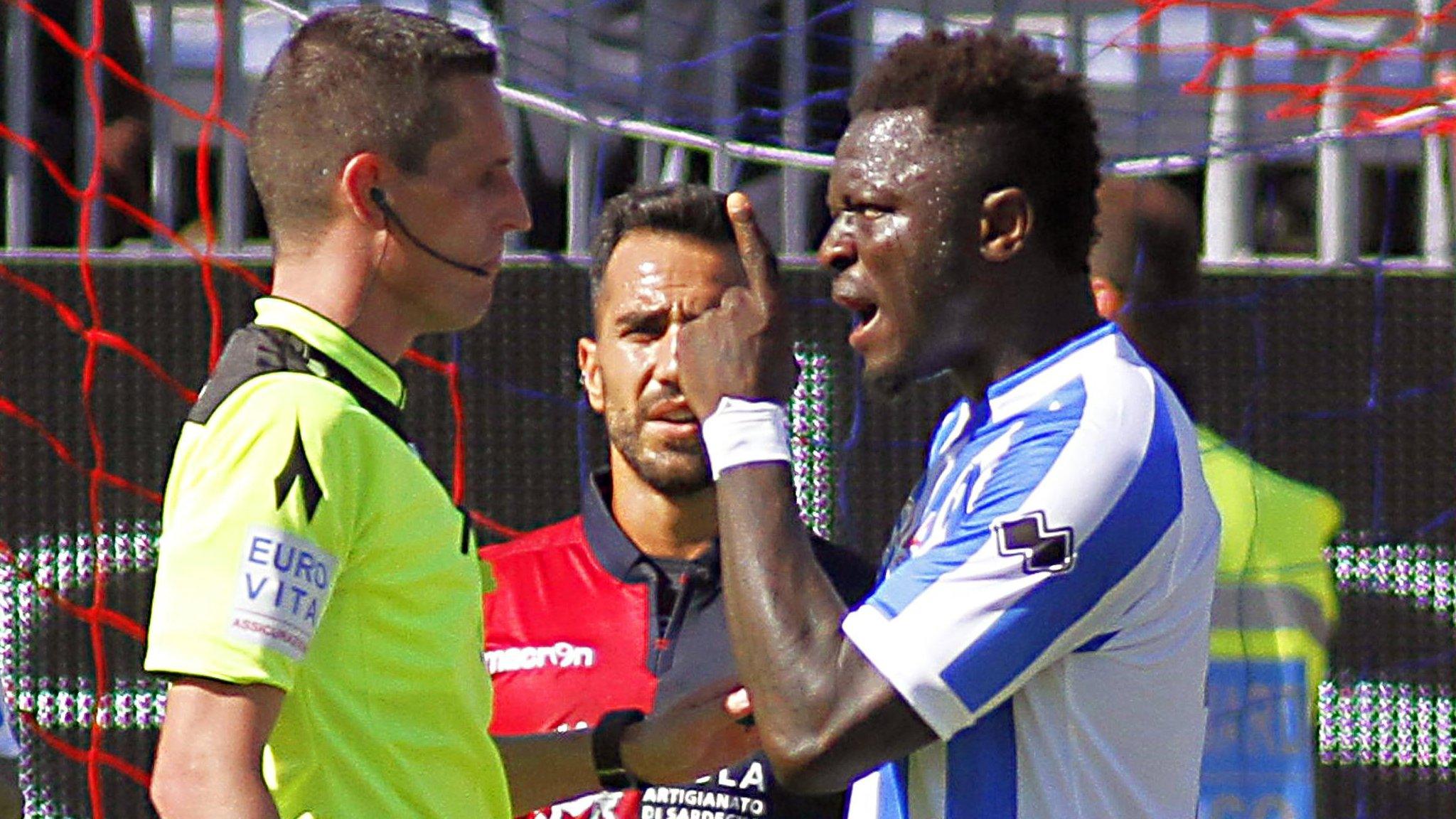 Sulley Muntari remonstrates with referee Daniele Minelli