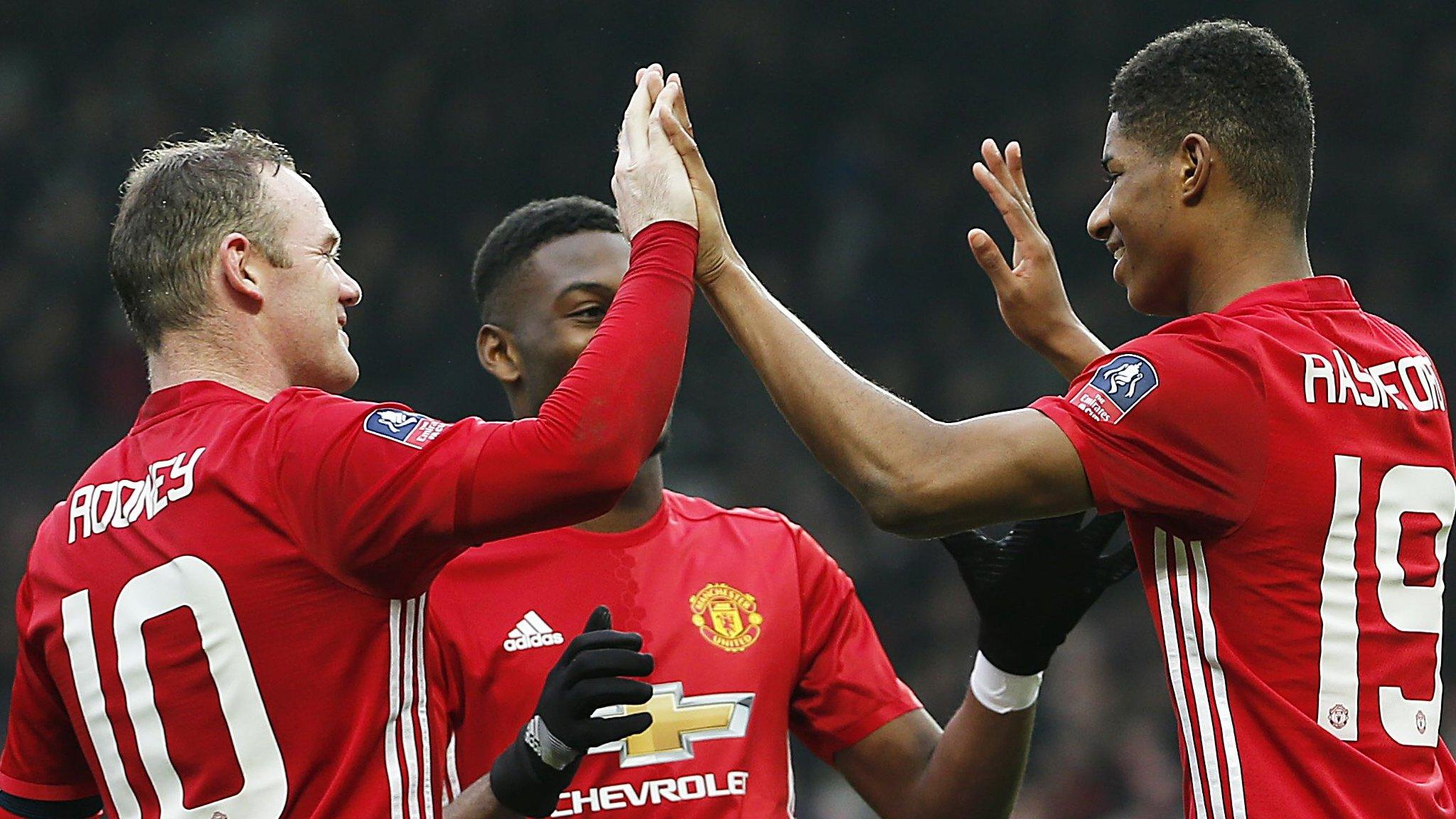 Manchester United players celebrate