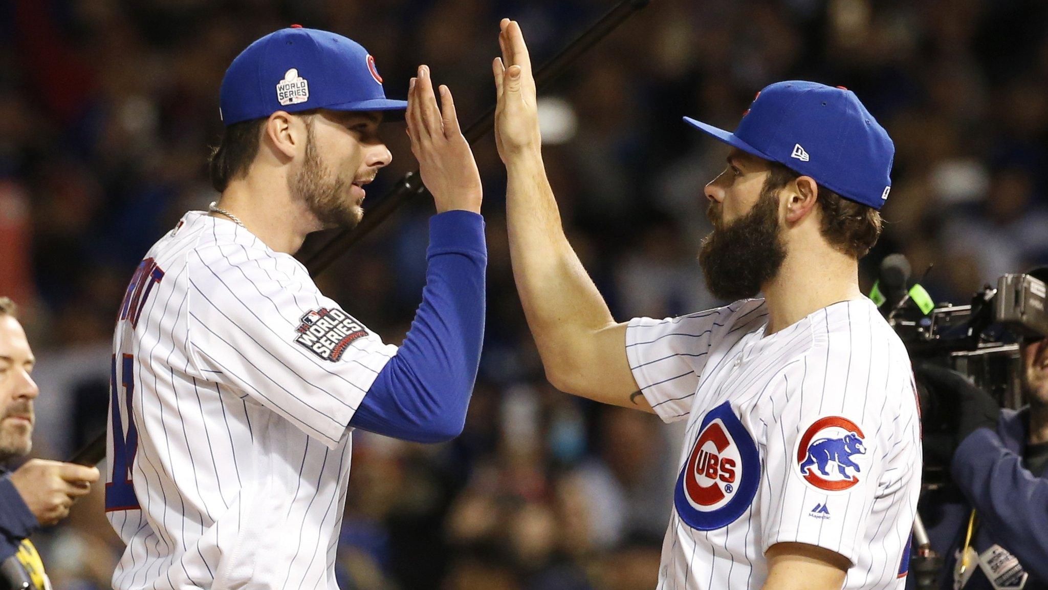 Kris Bryant, left, celebrates with Jake Arrieta after Game 5 of the Major League Baseball World Series against the Cleveland Indians