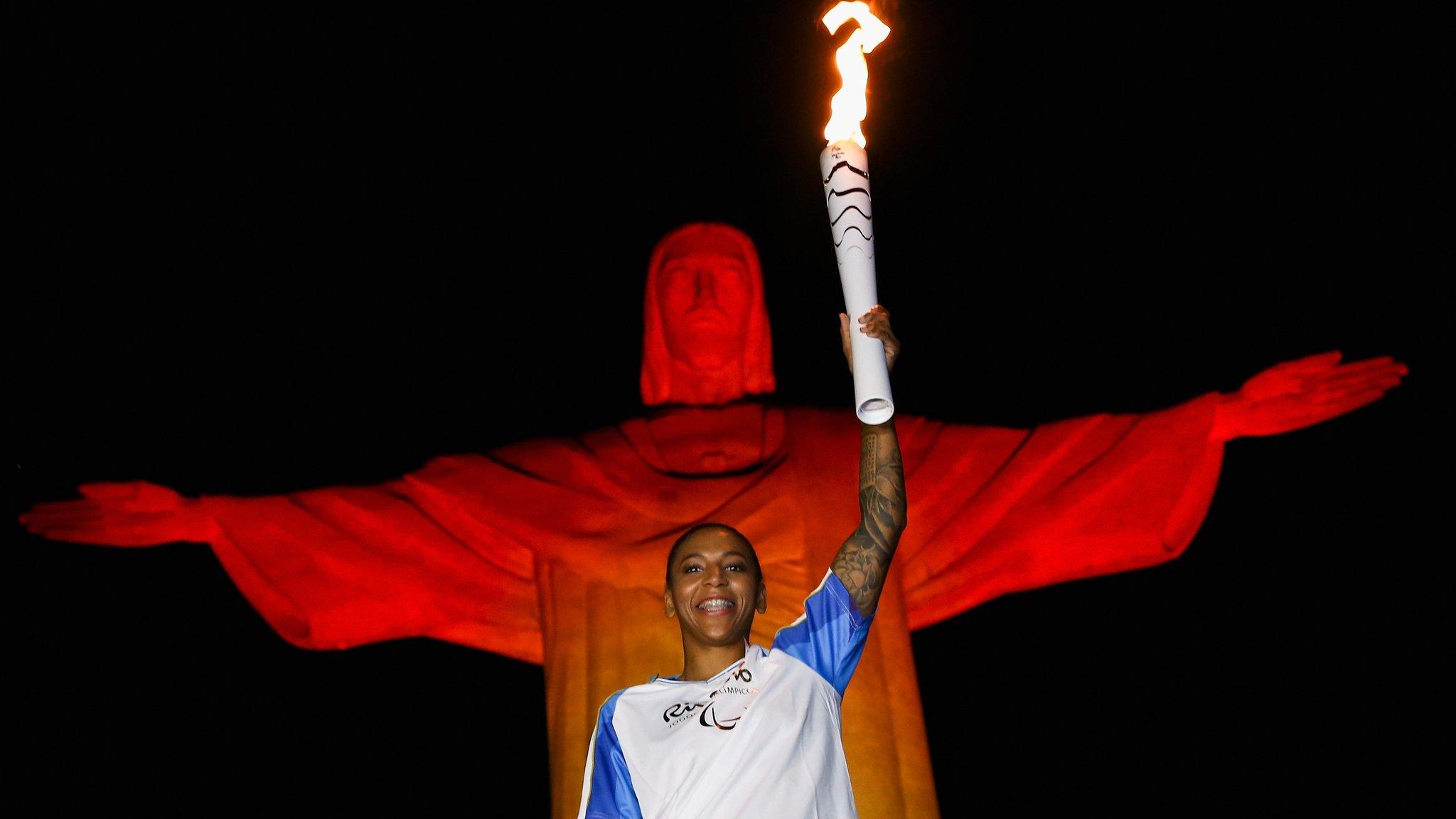 Paralympic torch bearer at the Christ the Redeemer statue