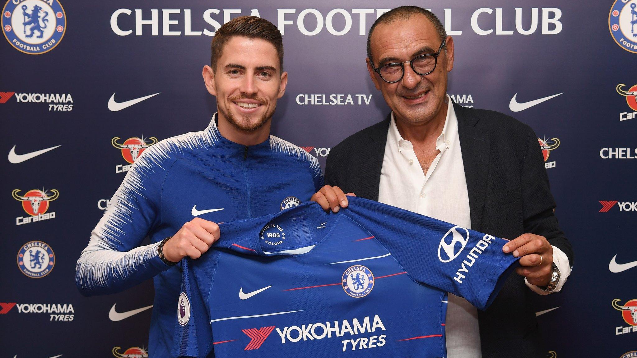 Chelsea signing Jorginho poses with Maurizio Sarri