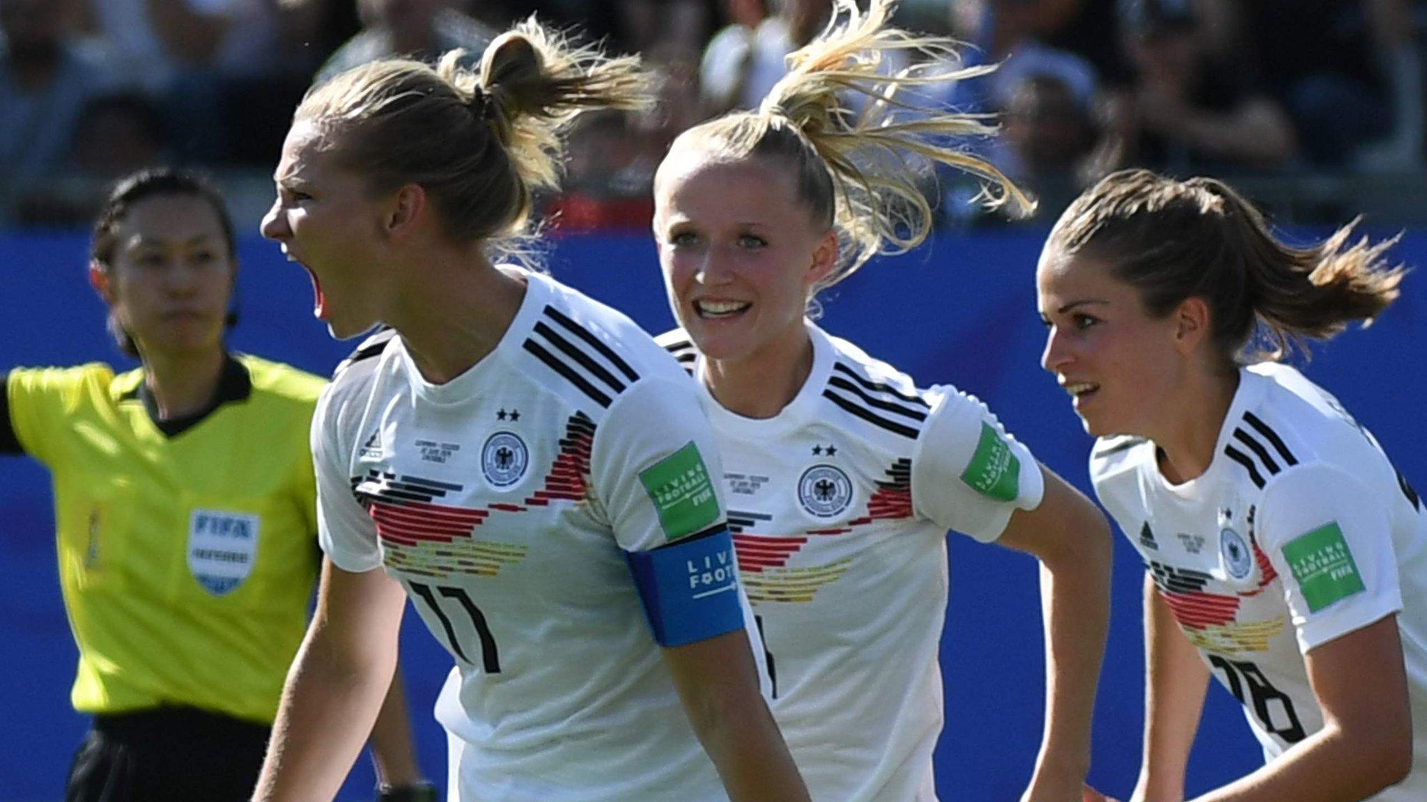 Alexandra Popp (left) celebrates scoring the first Germany goal