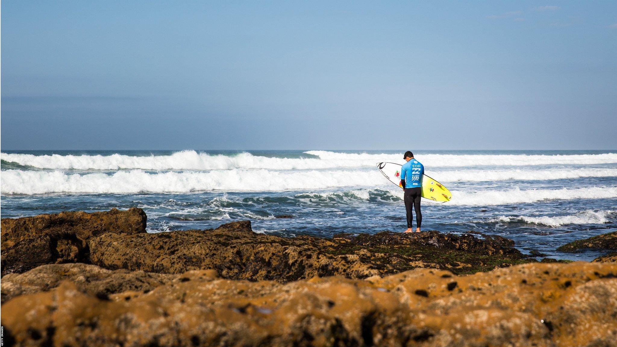 Ribeira D'Ilhas, Portugal, 29 September: Brazil's world champion surfer Gabriel Medina prays before entering the water in the EDP Billabong Pro Ericeira surfing competition on the QS World Tour. (Photo by Henrique Casinhas/NurPhoto via Getty Images)