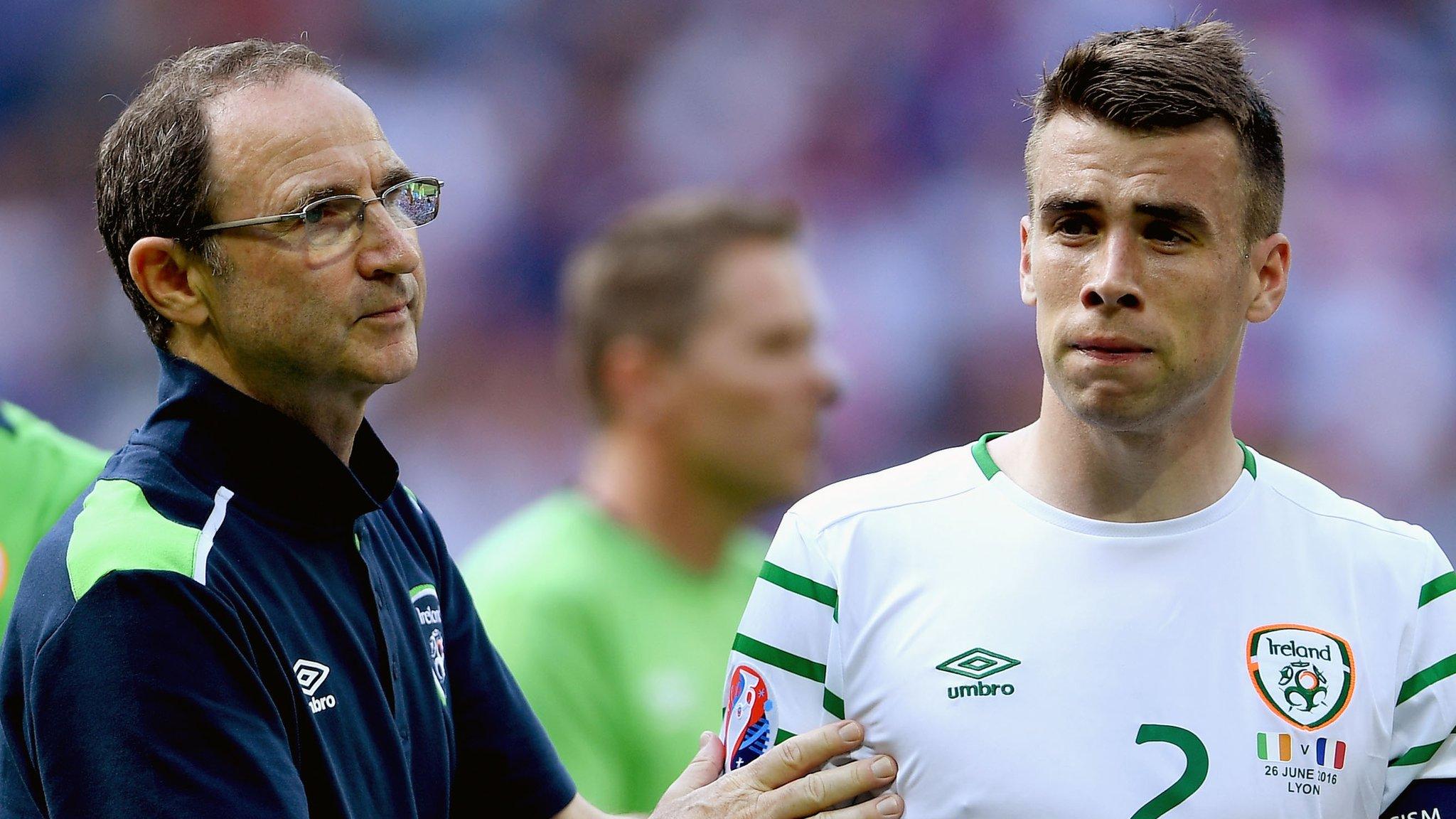 Republic of Ireland manager Martin O'Neill consoles captain Seamus Coleman after France's victory at Euro 2016