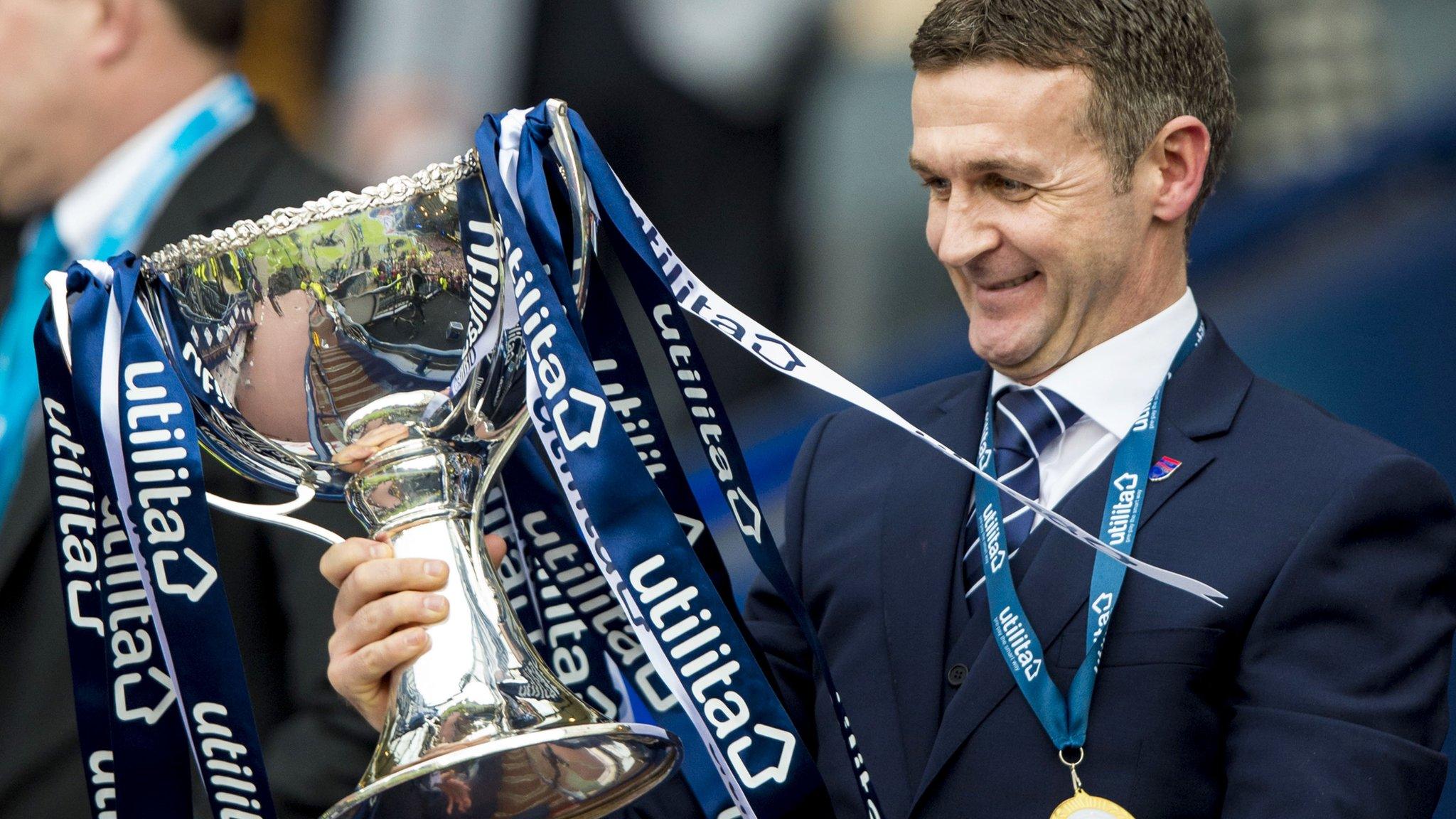 Ross County boss Jim McIntyre celebrates with the Scottish League Cup