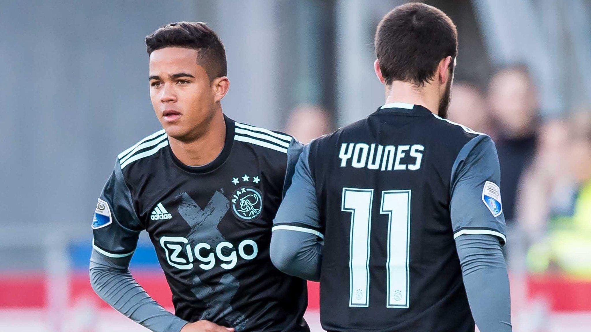 Justin Kluivert (left) comes on to make his senior debut for Ajax