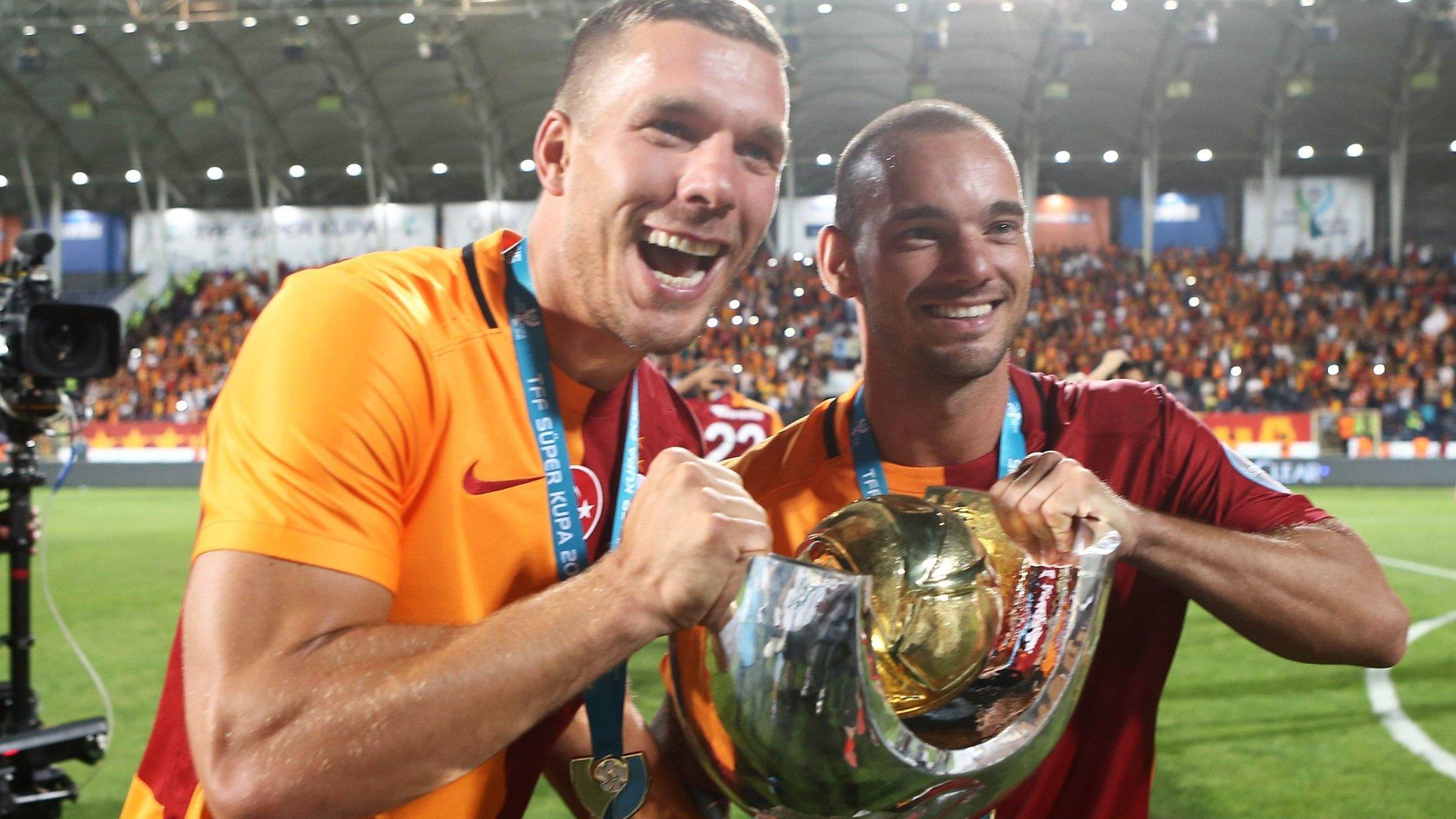 Lukas Podolski and Wesley Sneijder with the Turkish Super Cup