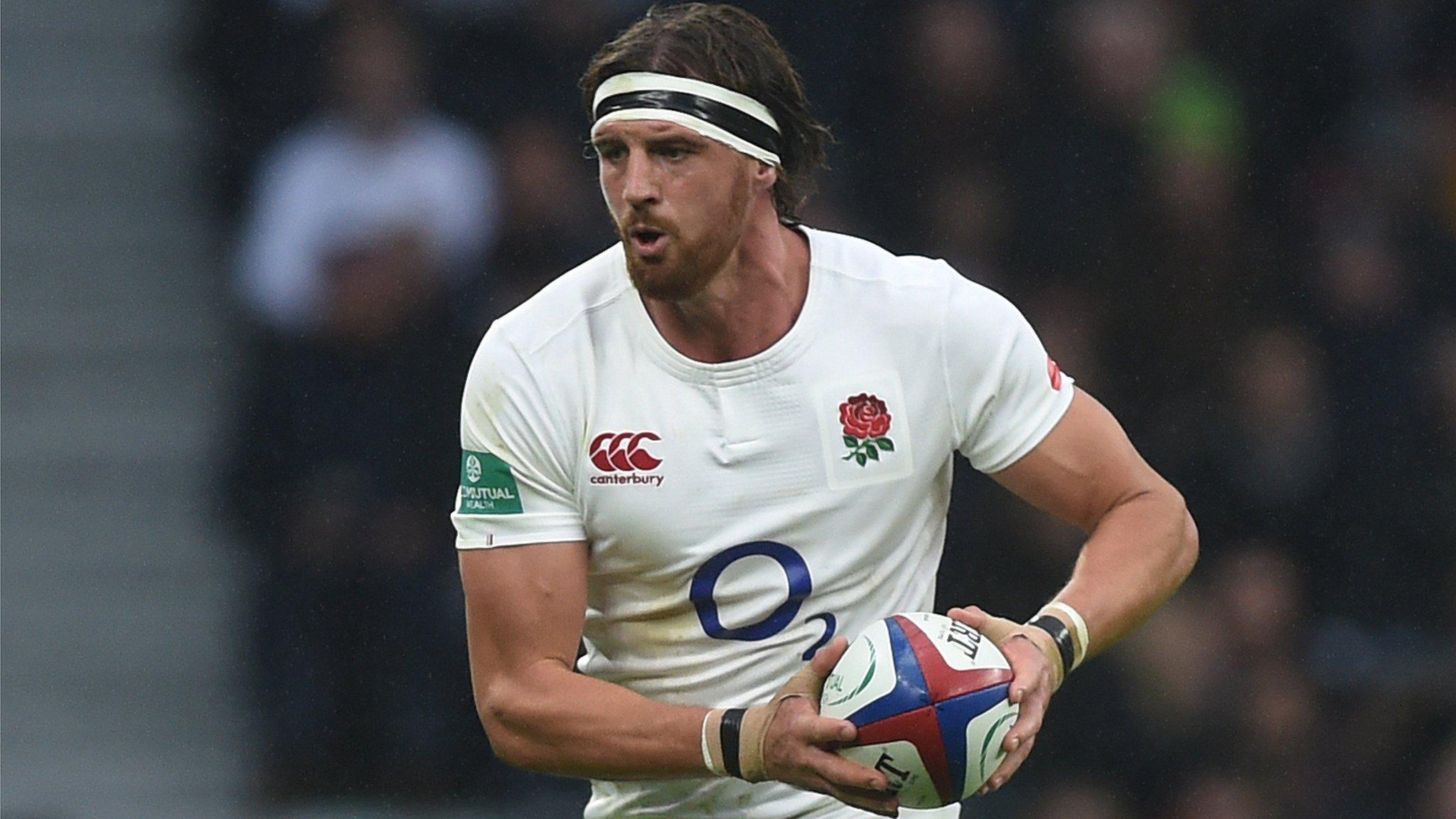 Former England captain Tom Wood carries the ball during a Test match