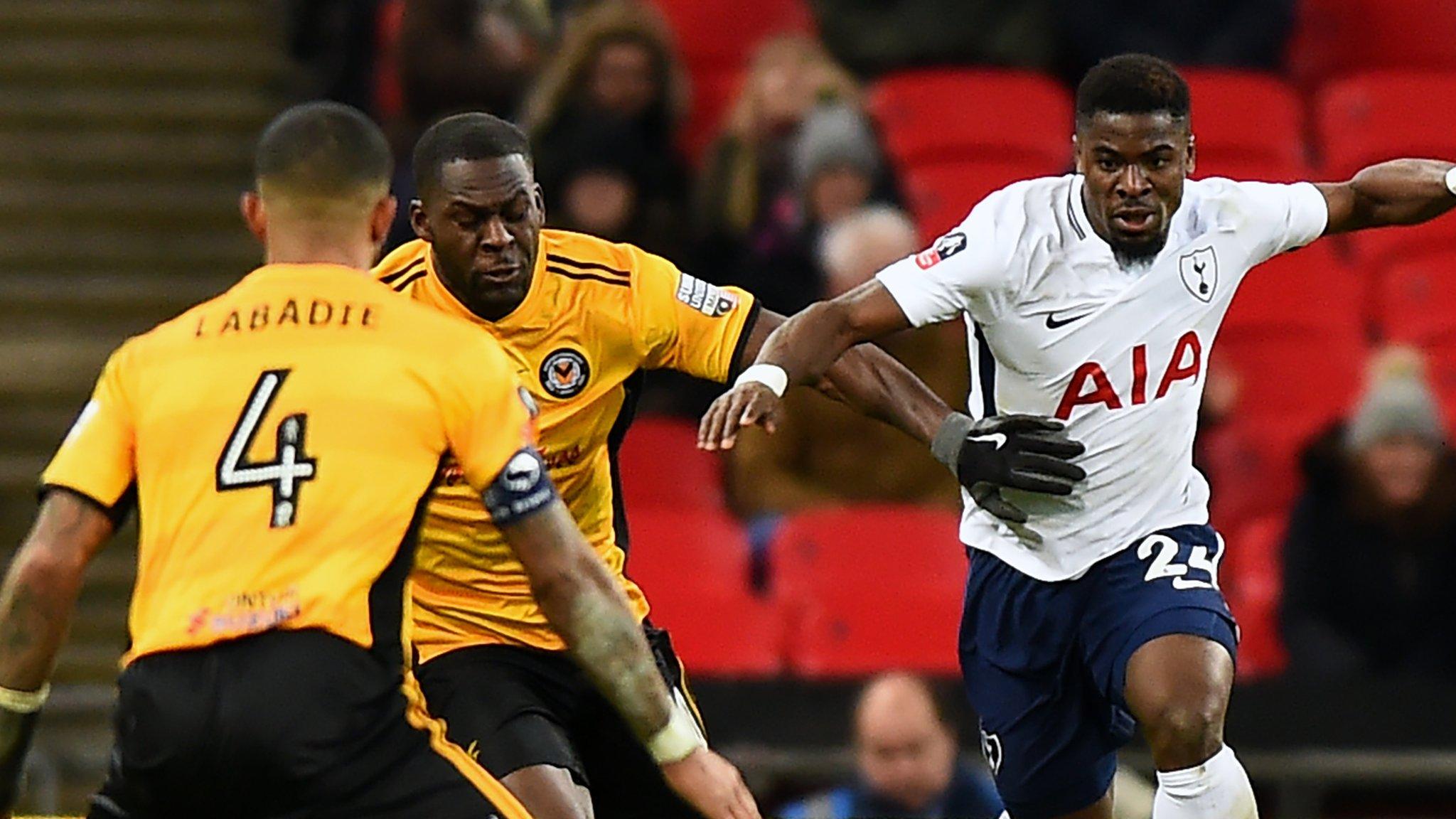 Frank Nouble and Joss Labadie in action against Tottenham