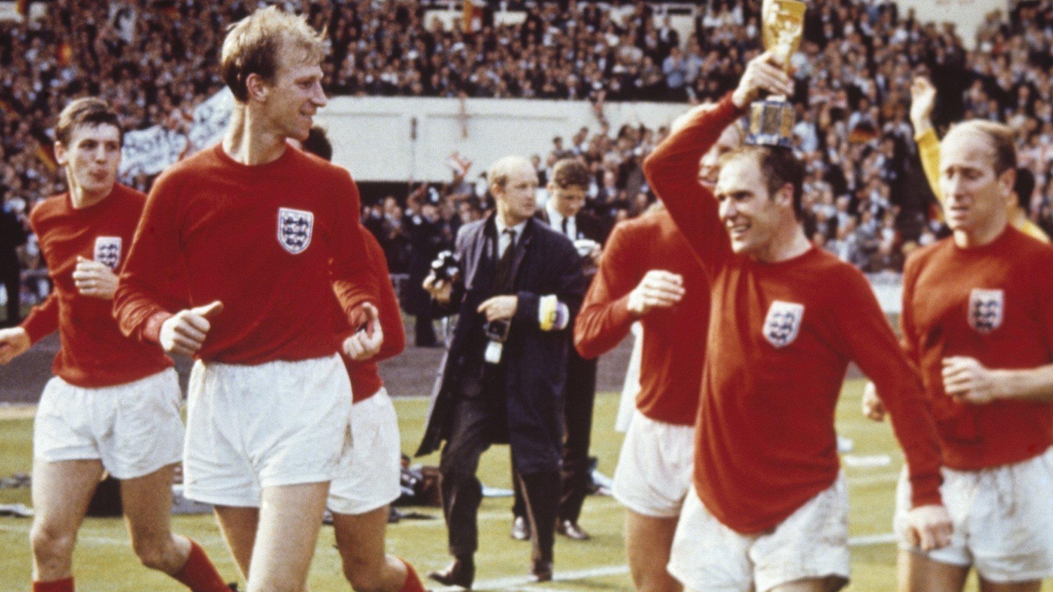 England's players celebrate with the Jules Rimet trophy at the end of the 1966 World Cup final