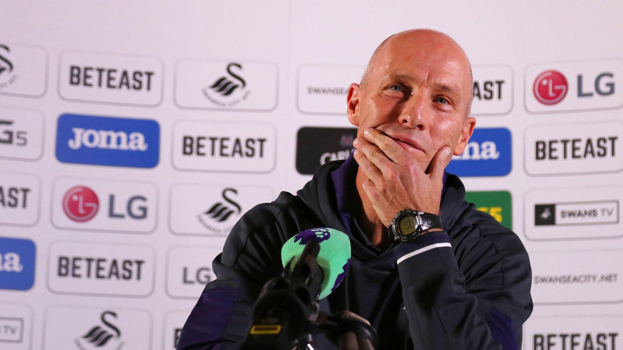 Bob Bradley looks thoughtful during a media conference