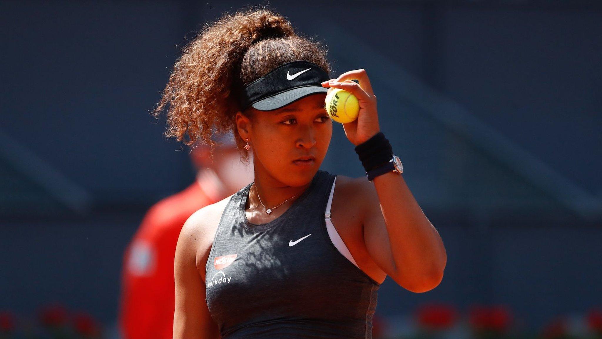 Naomi Osaka playing at the Madrid Open